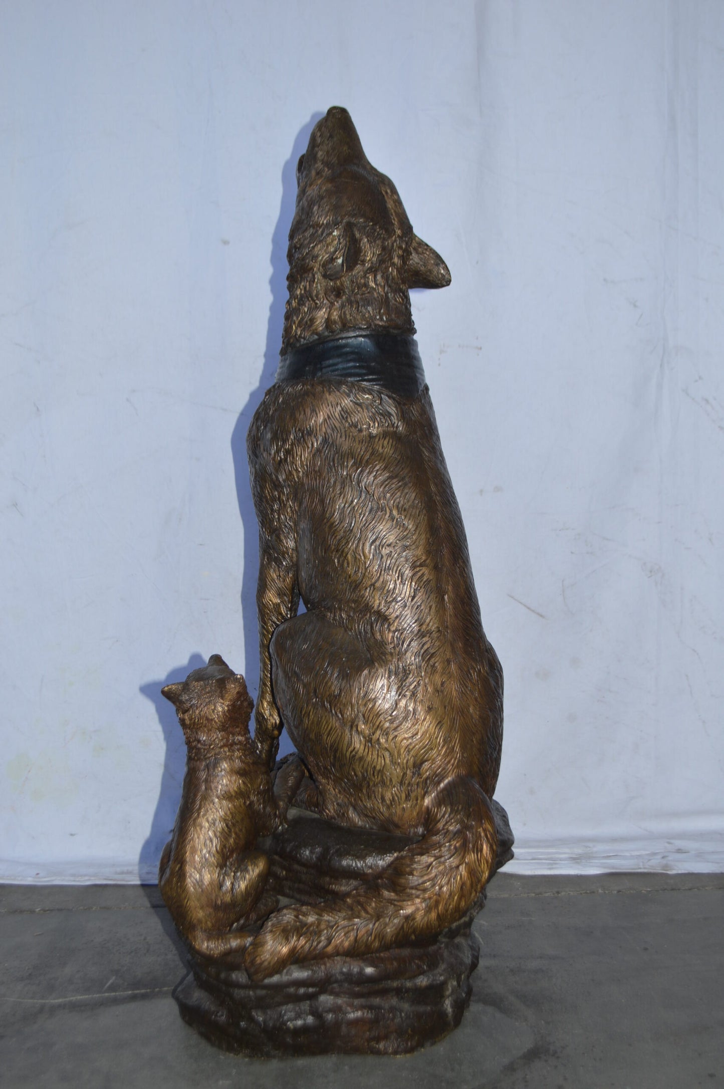 Wolf and her Cubs howling Bronze Statue - Size: 23"L x 20"W x 48"H.