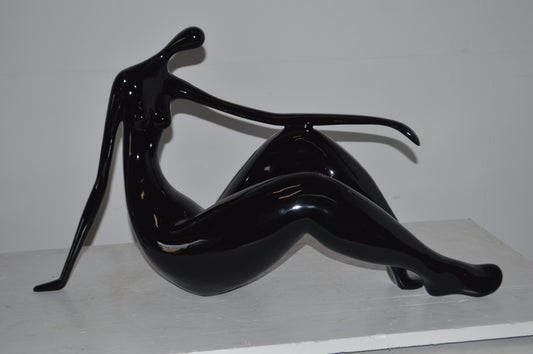 Modern Art Women on the Beach Black Resin Statue - Size: 28"L x 8"W x 16"H.