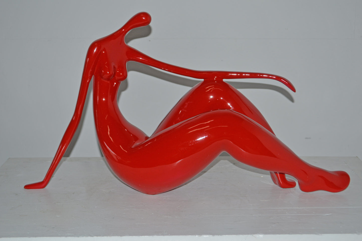 Modern Art Red Women on the Beach Resin Statue - Size: 28"L x 8"W x 16"H.