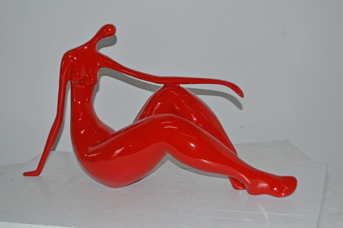 Modern Art Red Women on the Beach Resin Statue - Size: 28"L x 8"W x 16"H.