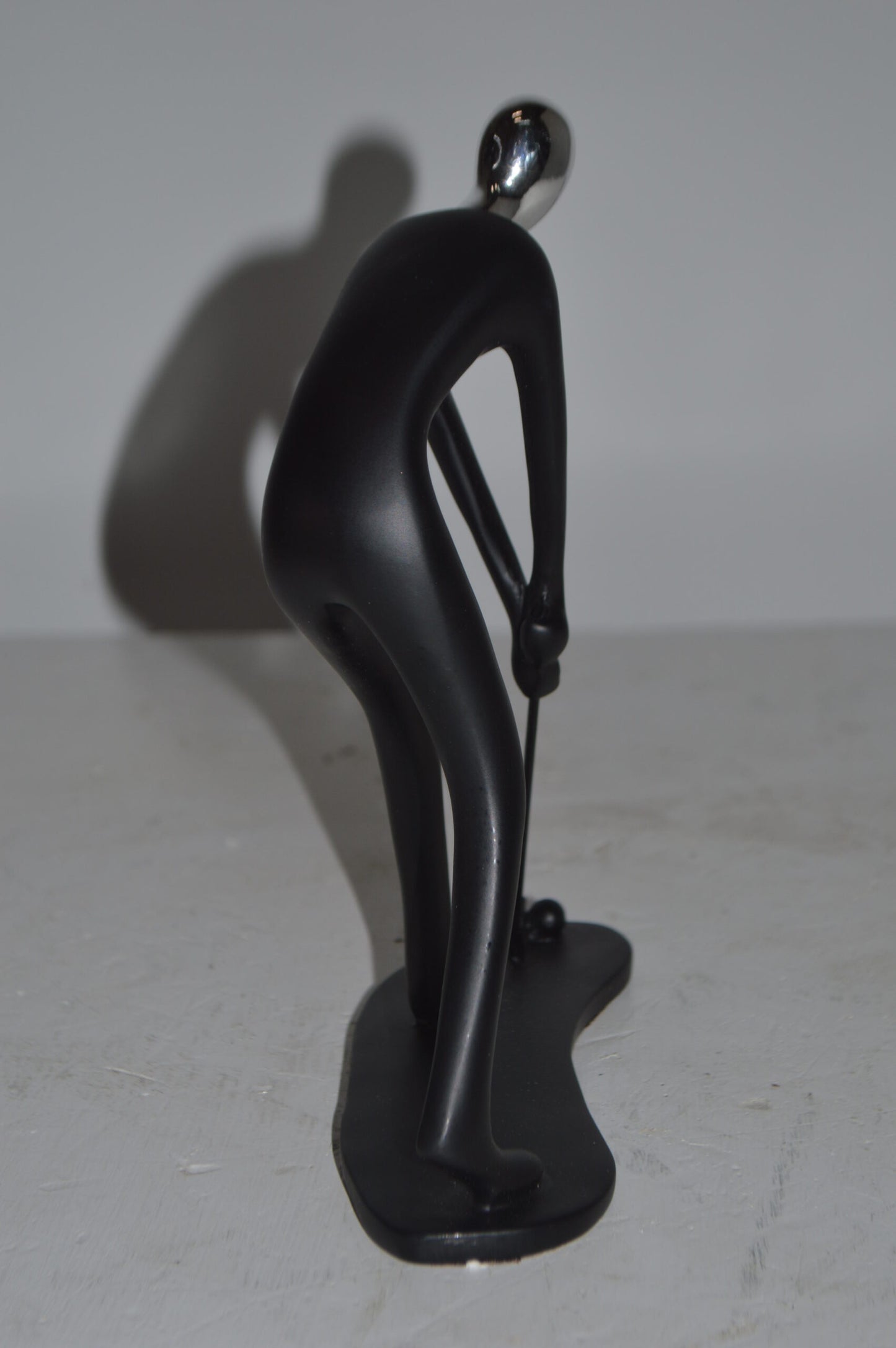 Modern art Black Golfer with Silver Head Resin Statue - Size: 7"L x 2"W x 9"H.