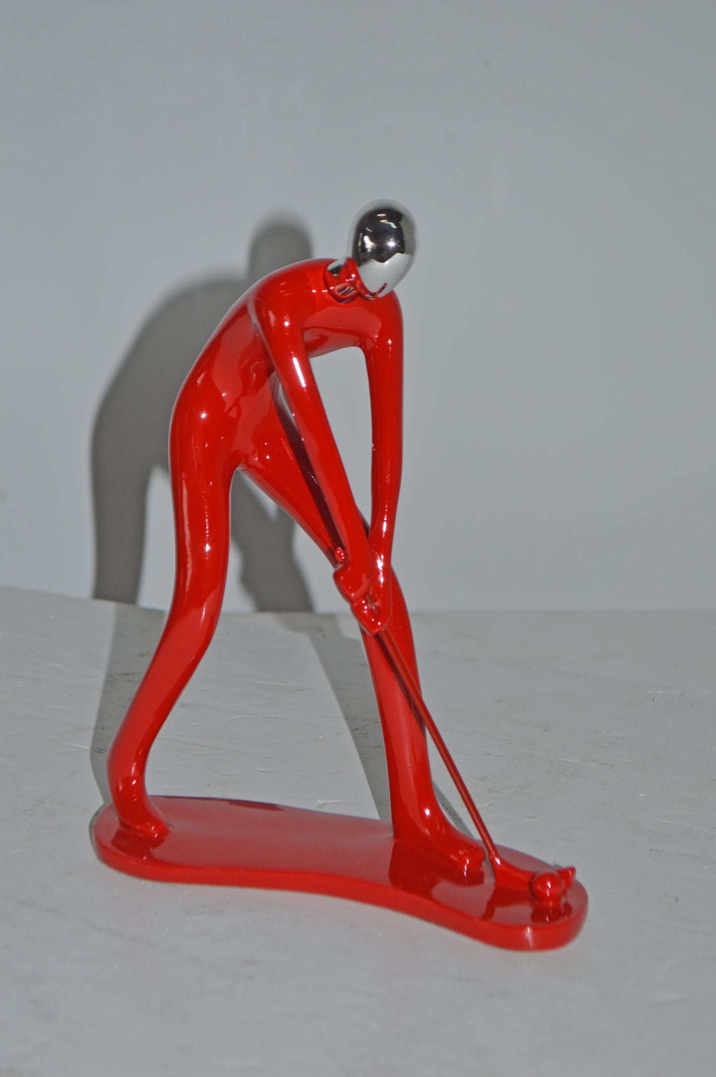 Modern art Red Golfer with Silver Head Resin Statue - Size: 7"L x 2"W x 9"H.