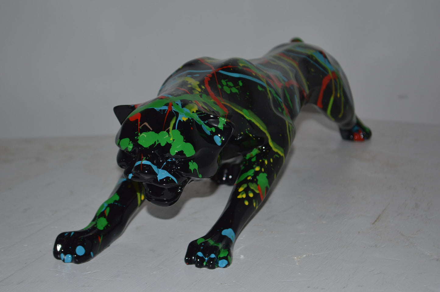 Modern Art Black Jaguar mixed colors Resin Statue - Size: 27"L x 7"W x 7"H.