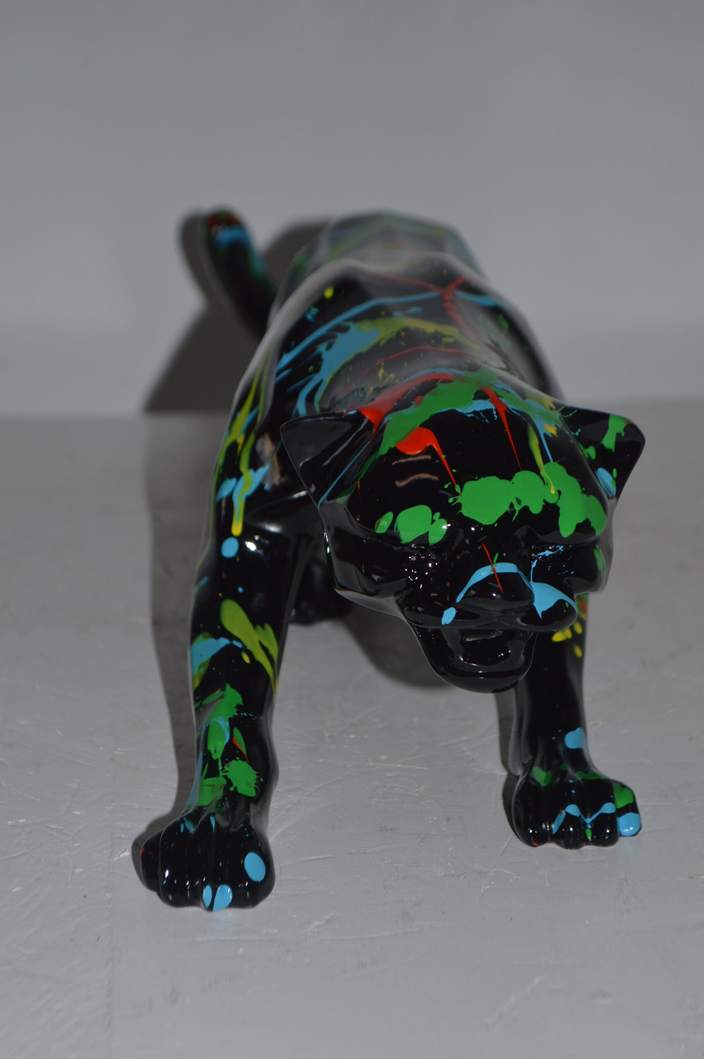Modern Art Black Jaguar mixed colors Resin Statue - Size: 27"L x 7"W x 7"H.