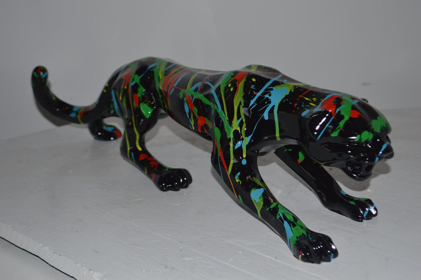Modern Art Black Jaguar mixed colors Resin Statue - Size: 27"L x 7"W x 7"H.