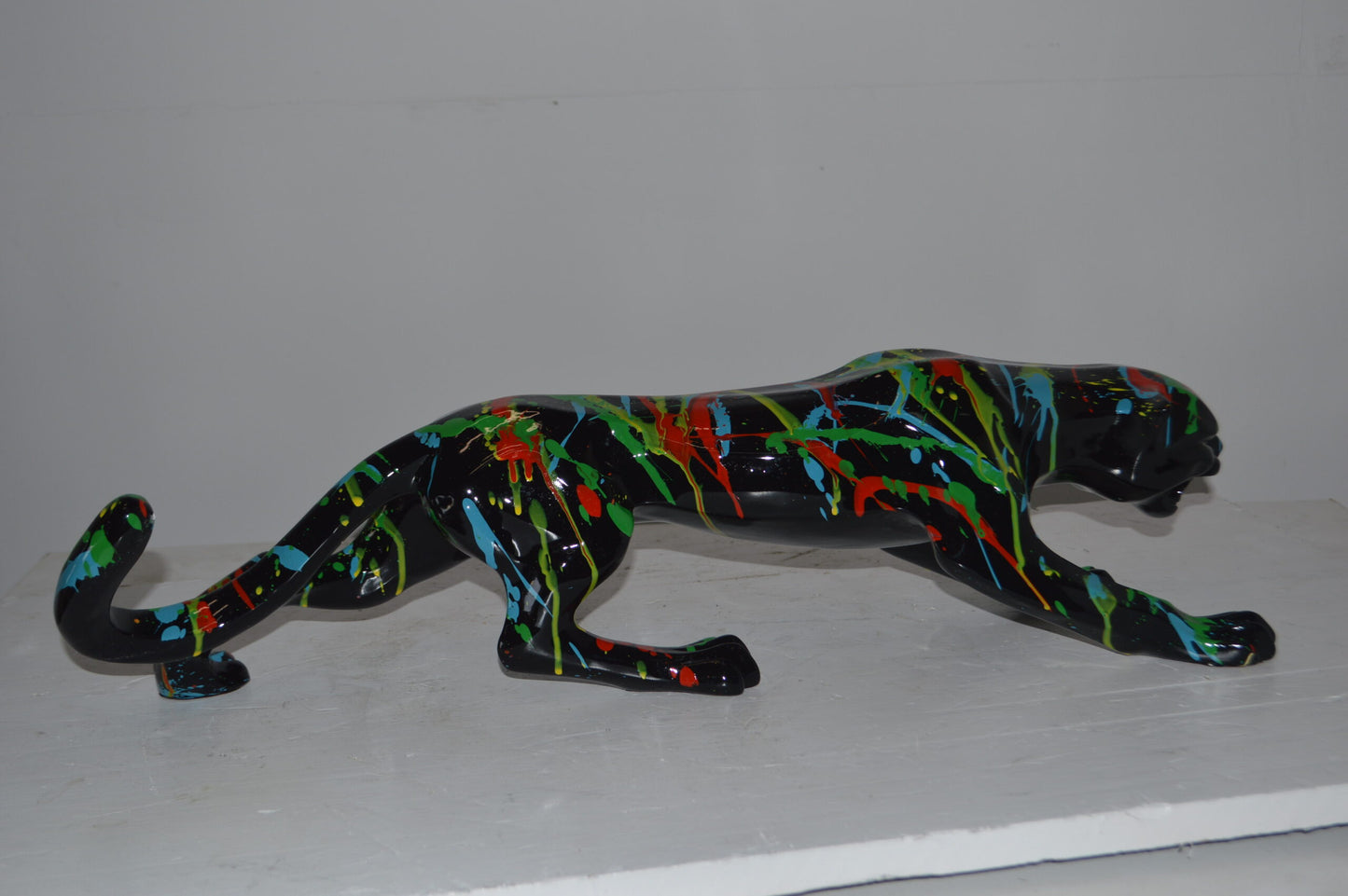 Modern Art Black Jaguar mixed colors Resin Statue - Size: 27"L x 7"W x 7"H.