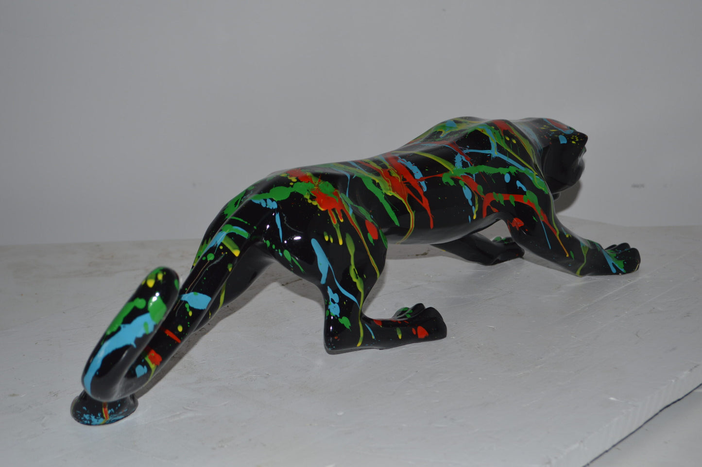 Modern Art Black Jaguar mixed colors Resin Statue - Size: 27"L x 7"W x 7"H.