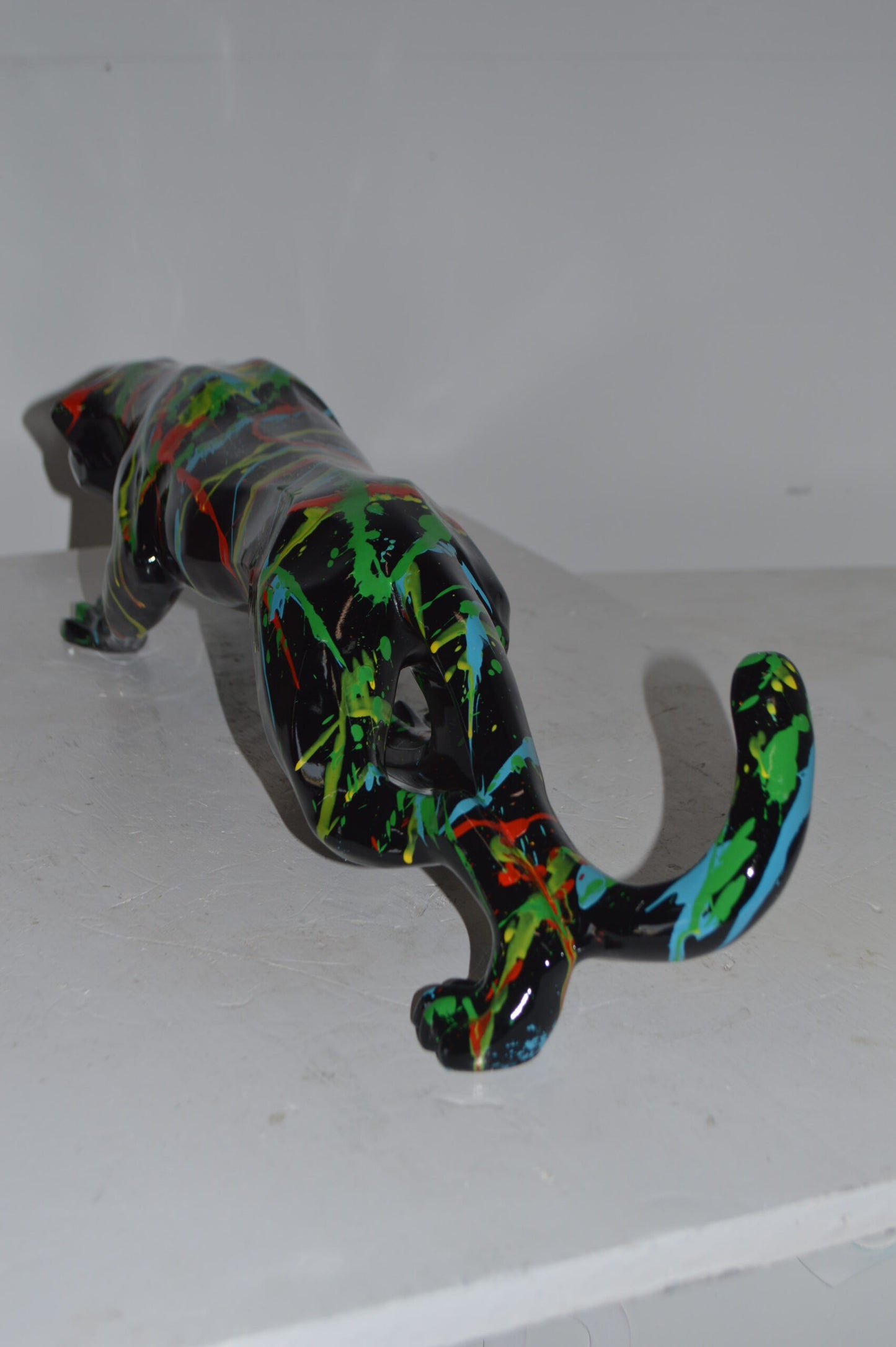 Modern Art Black Jaguar mixed colors Resin Statue - Size: 27"L x 7"W x 7"H.