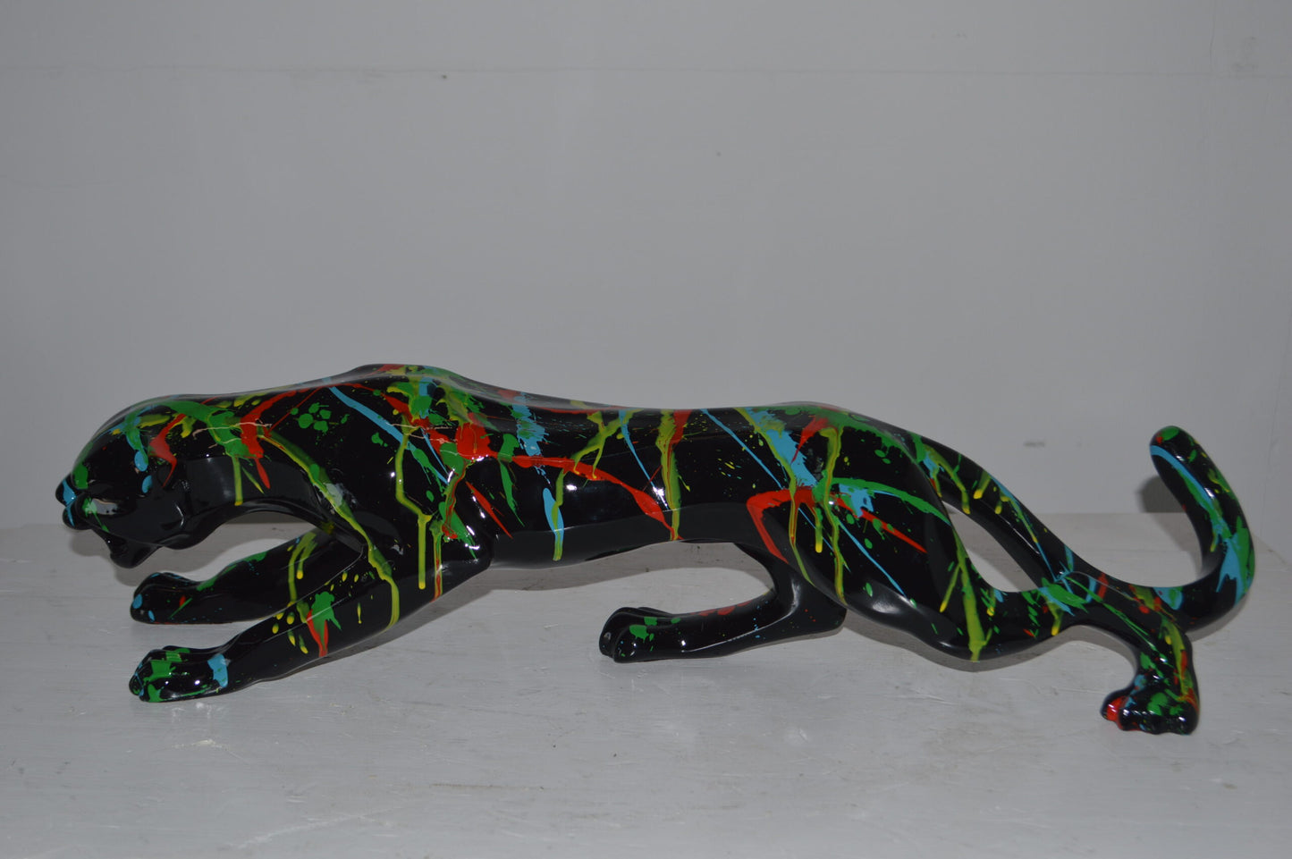 Modern Art Black Jaguar mixed colors Resin Statue - Size: 27"L x 7"W x 7"H.