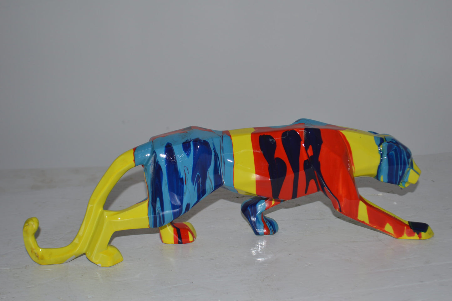 Modern Art Small Colored Jaguar Statue Made of Resin - Size: 17"L x 4"W x 5"H.