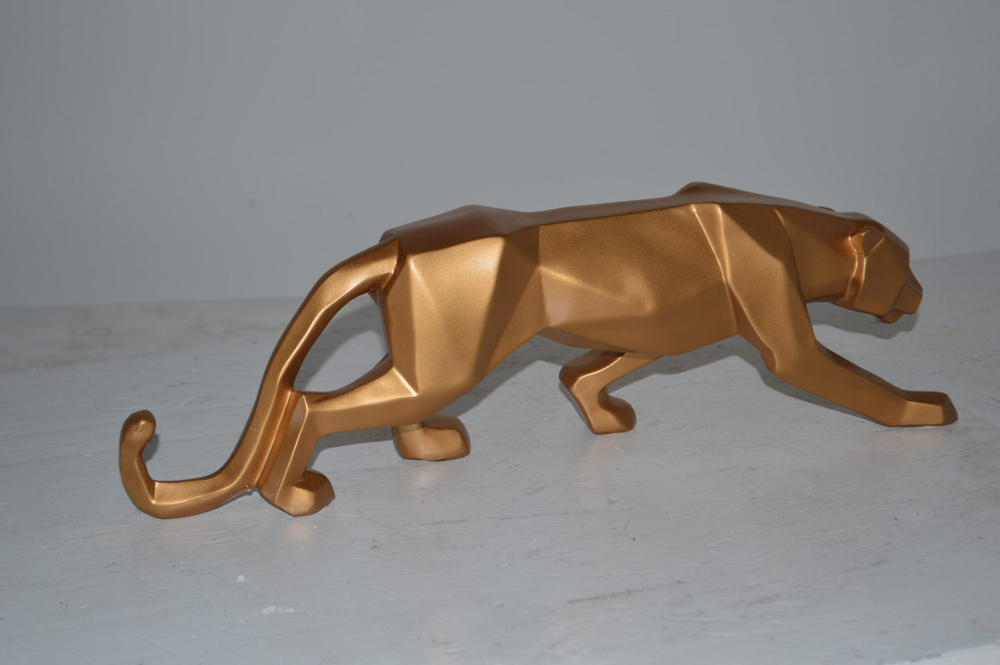 Modern Art Small Gold Jaguar Statue Made of Resin - Size: 17"L x 4"W x 5"H.