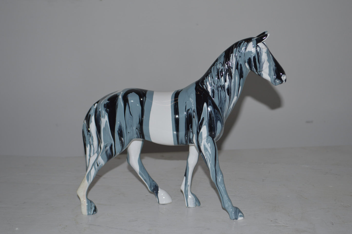 Modern Art Multi Color Horse Resin Statue - Size: 4"L x 13"W x 11"H.