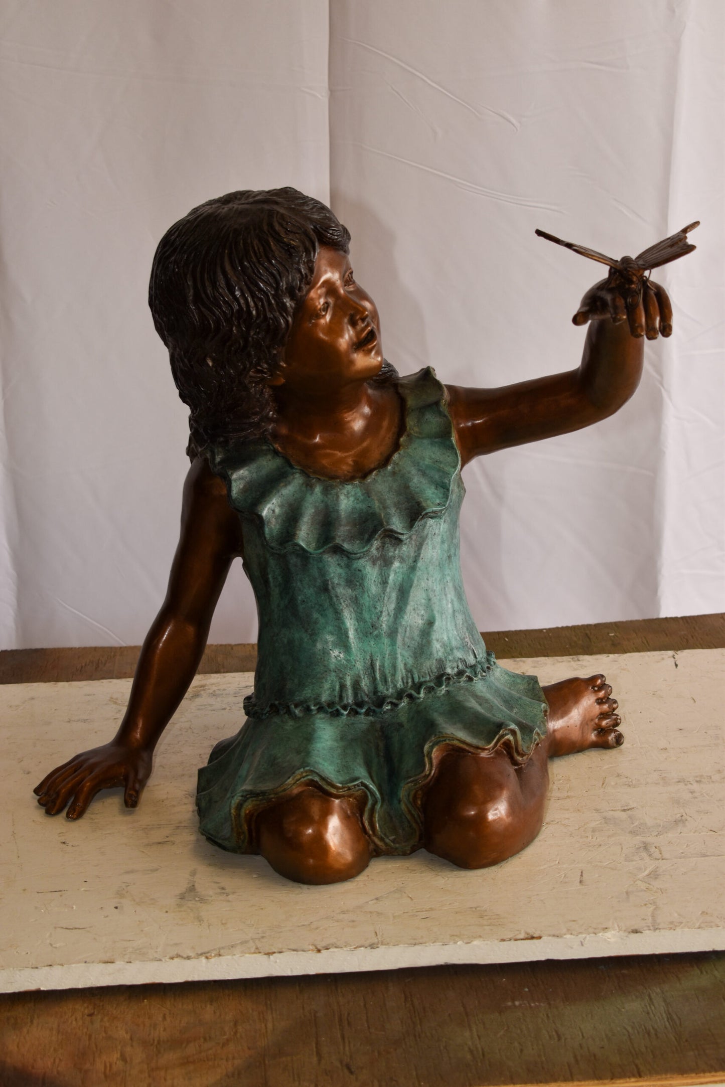A Little Girl Playing with a Buterfly Bronze Statue 21" x 15" x 19"H