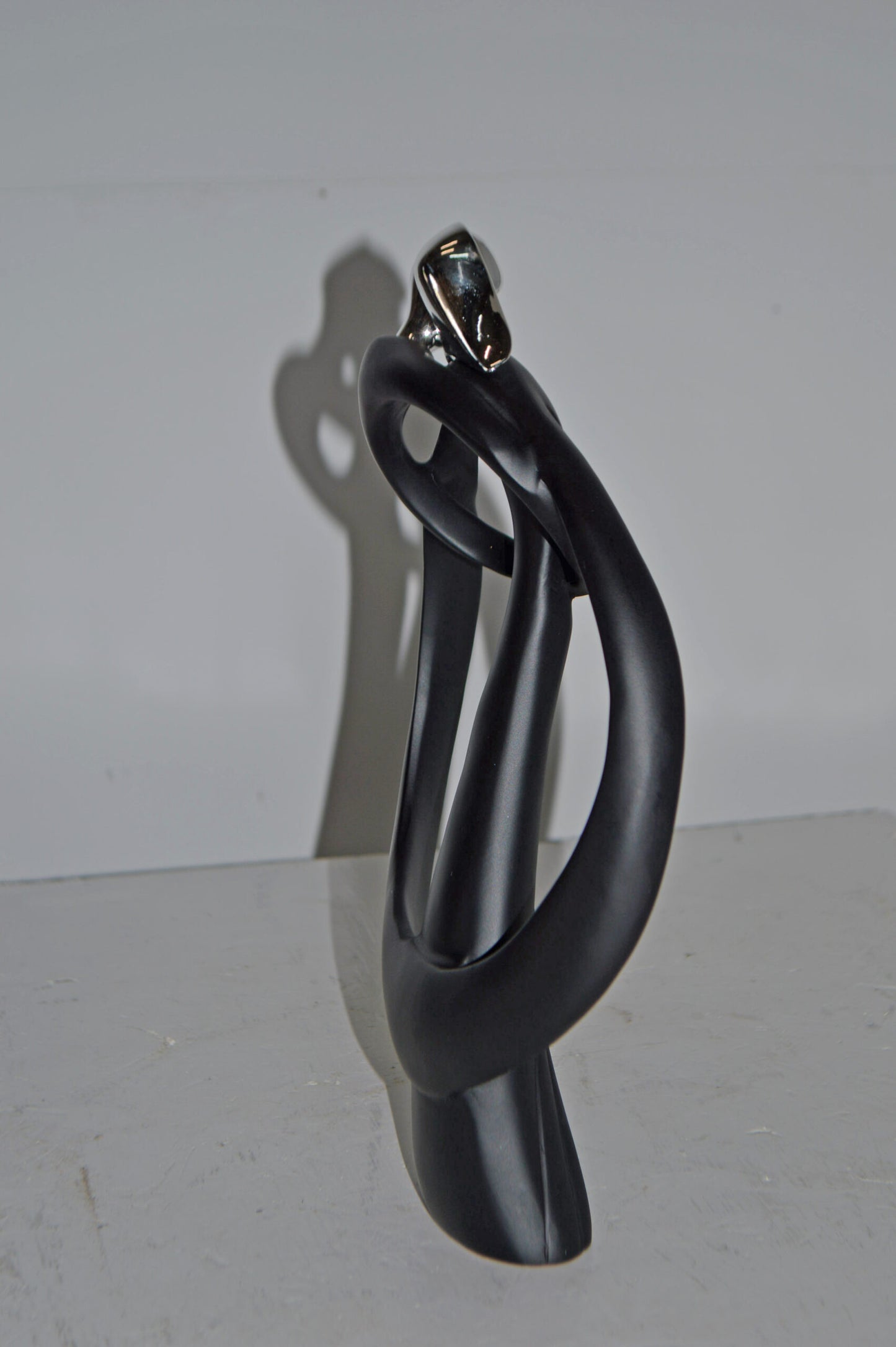 Modern Art of Couple Hugging Black Chrome Resin Statue - Size: 8"L x 2"W x 12"H