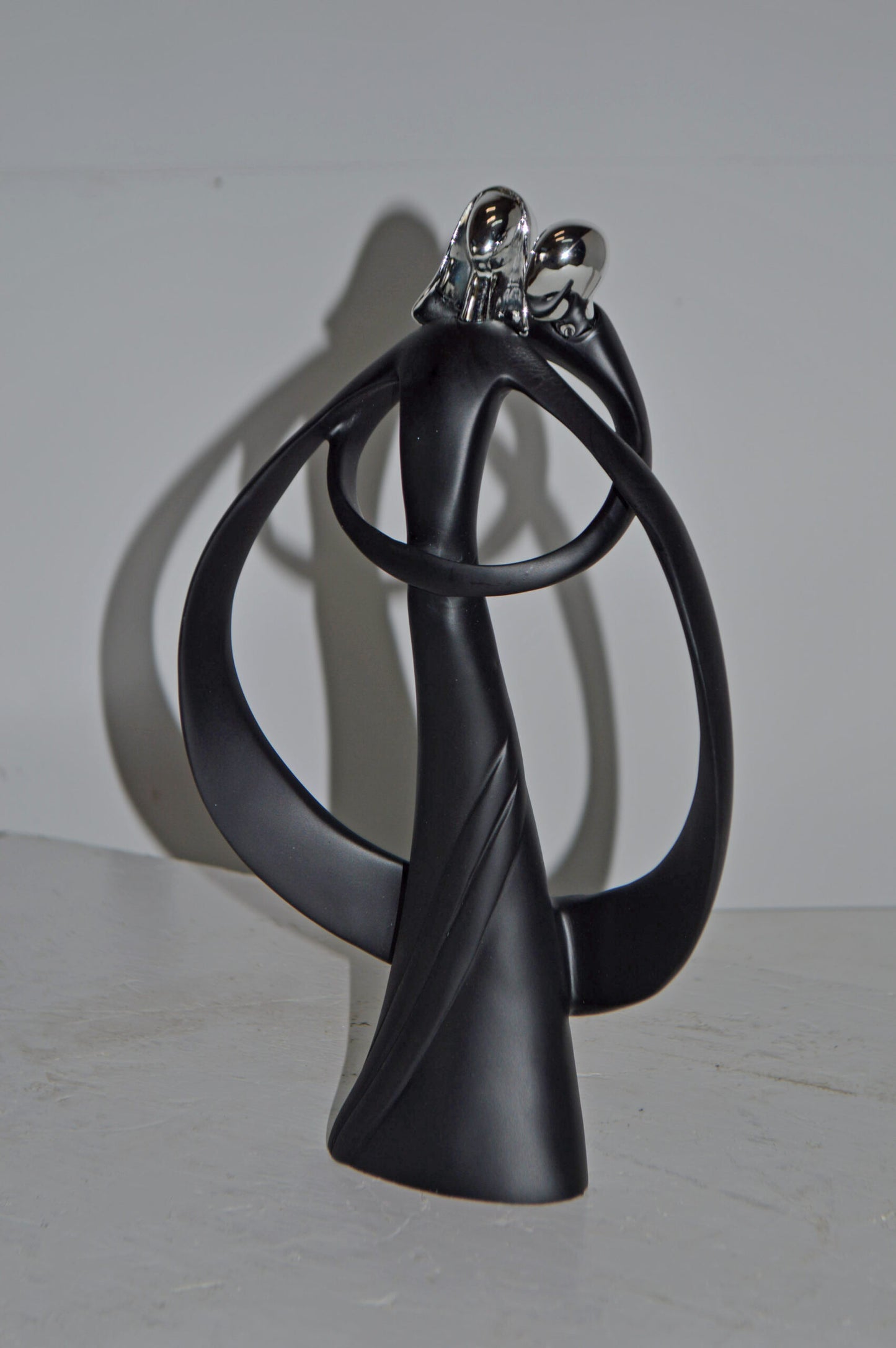 Modern Art of Couple Hugging Black Chrome Resin Statue - Size: 8"L x 2"W x 12"H