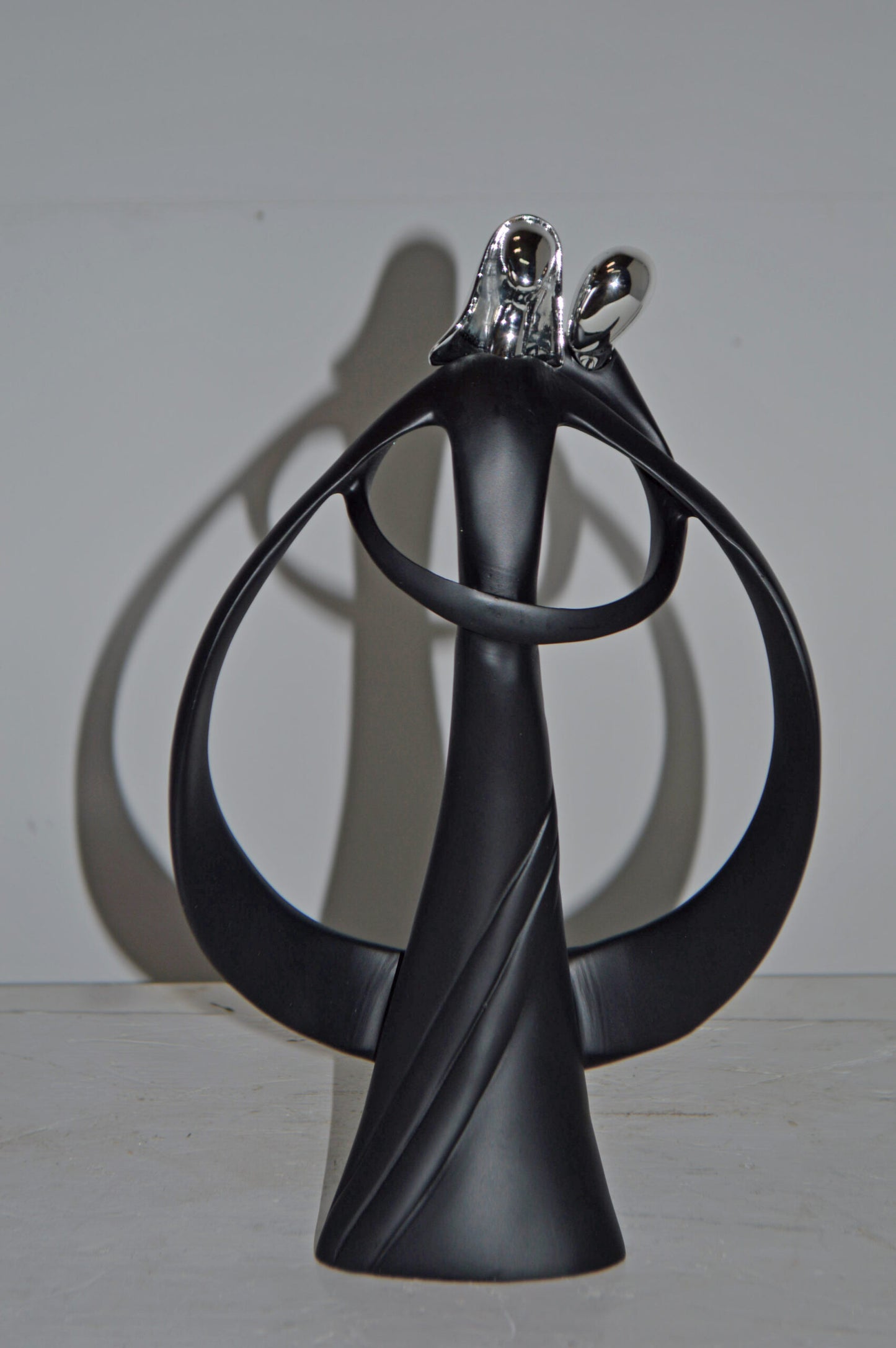 Modern Art of Couple Hugging Black Chrome Resin Statue - Size: 8"L x 2"W x 12"H