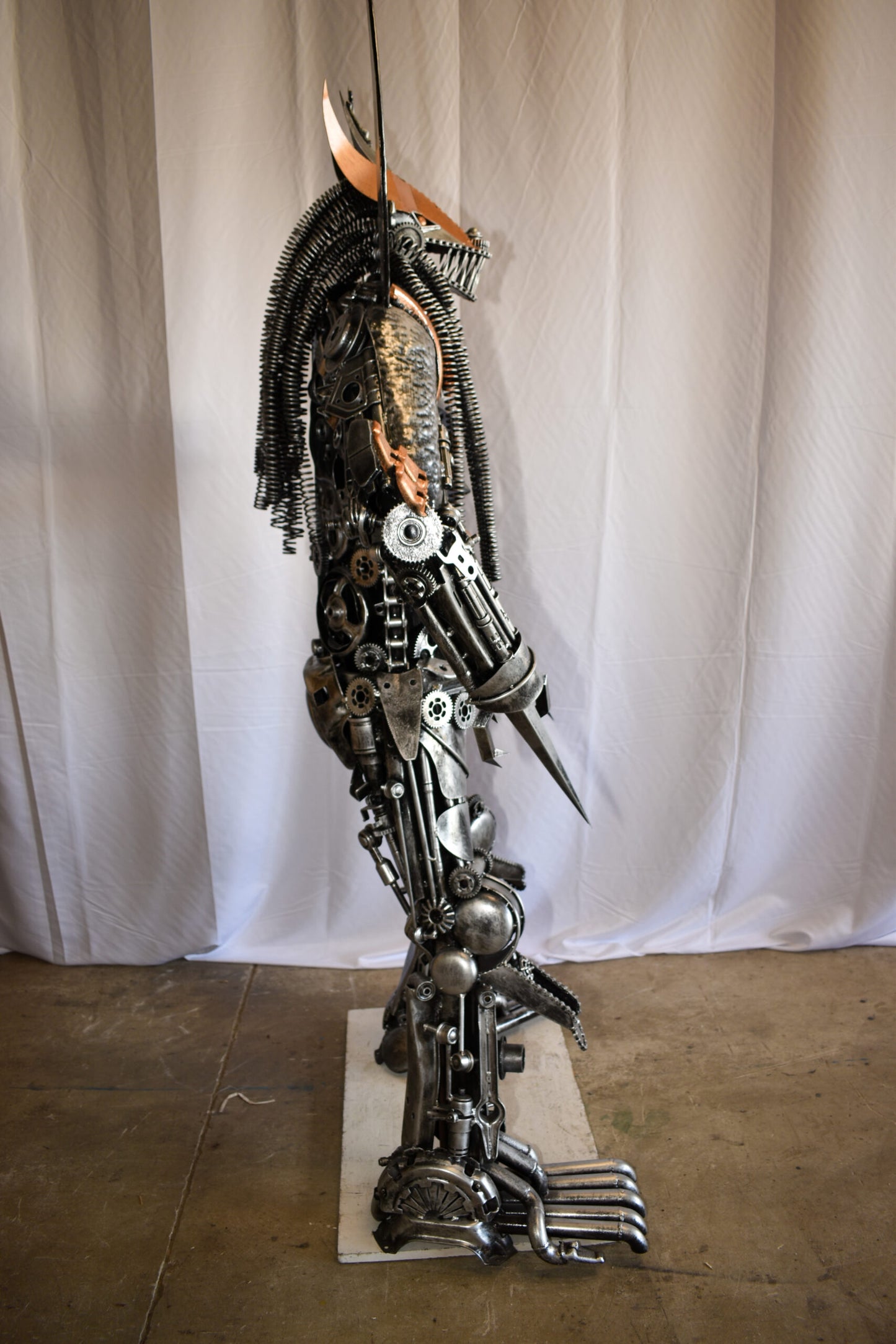 Colorfull impresive Statue of a warrier made of metal scraps 48" x 20" x 82"H