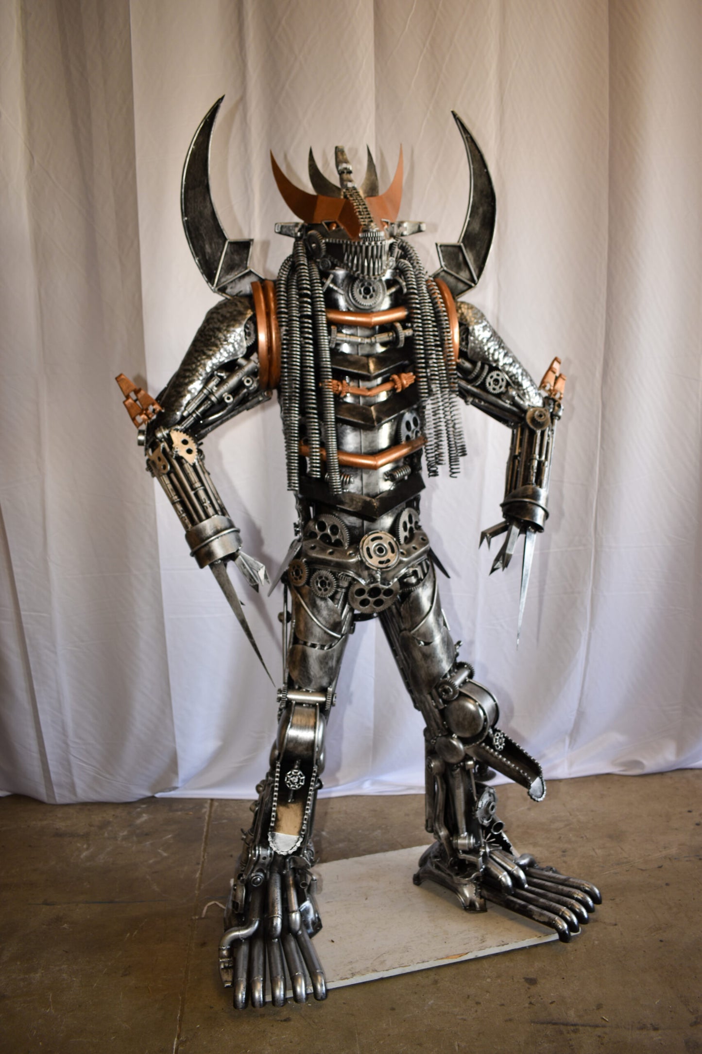 Colorfull impresive Statue of a warrier made of metal scraps 48" x 20" x 82"H