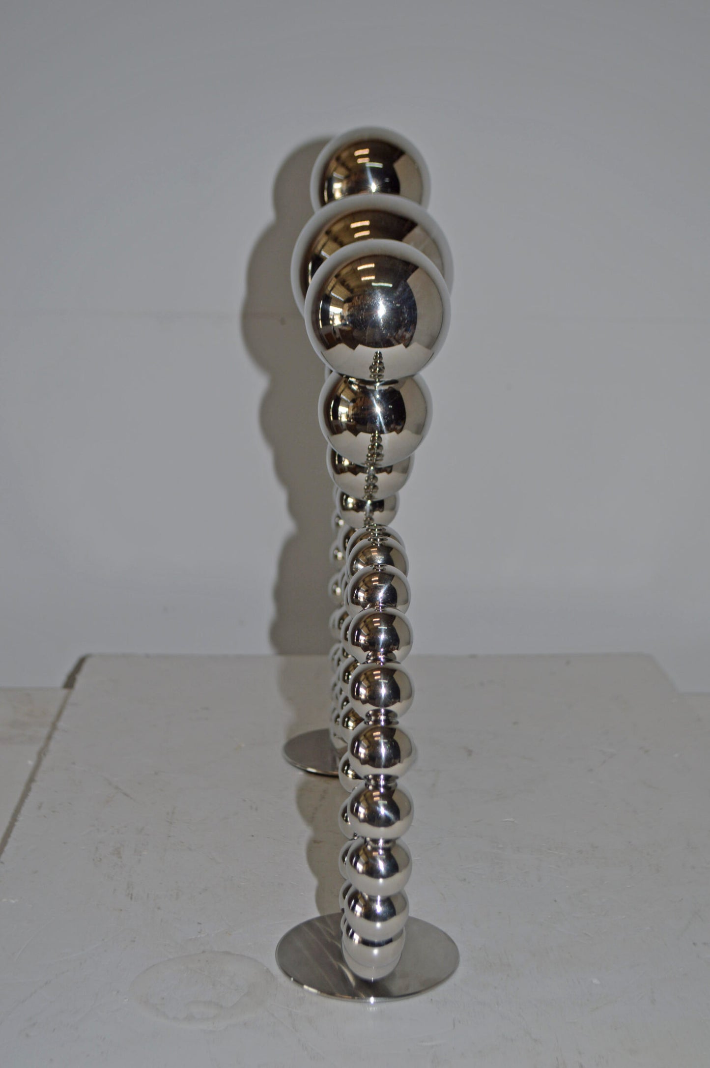 Modern Art Rider on His Bicycle Chrome Statue - Size: 22"L x 4"W x 17"H.