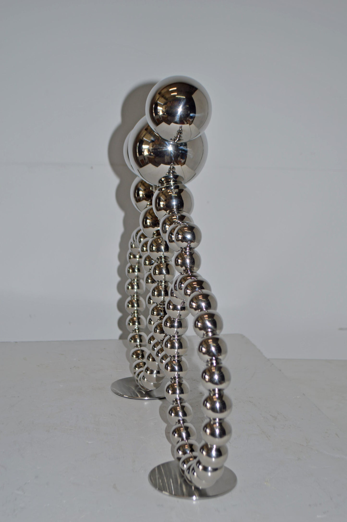 Modern Art Rider on His Bicycle Chrome Statue - Size: 22"L x 4"W x 17"H.