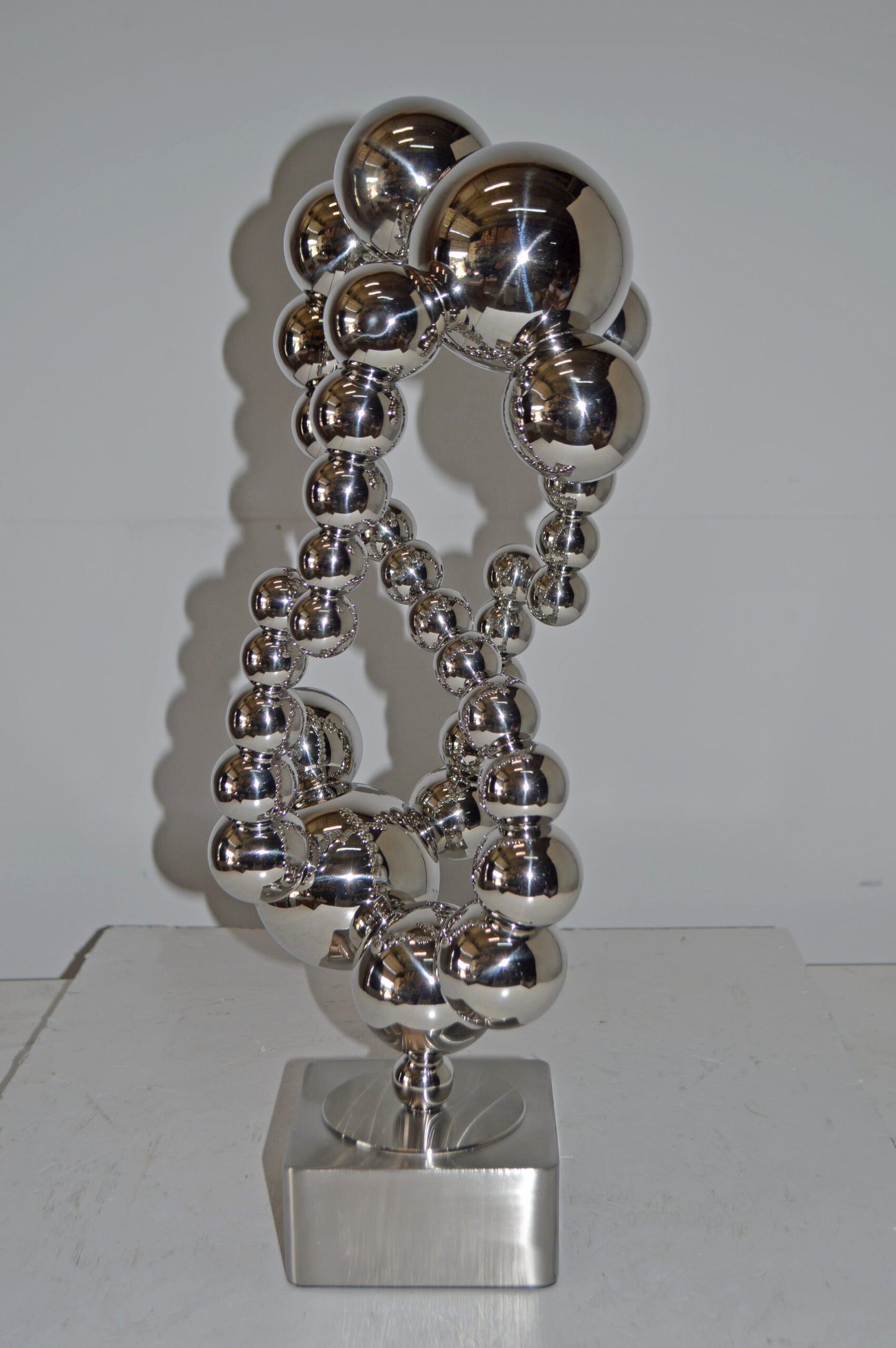 Modern Art Abstract Made of Chrome Balls Statue - Size: 11"L x 10"W x 22"H.