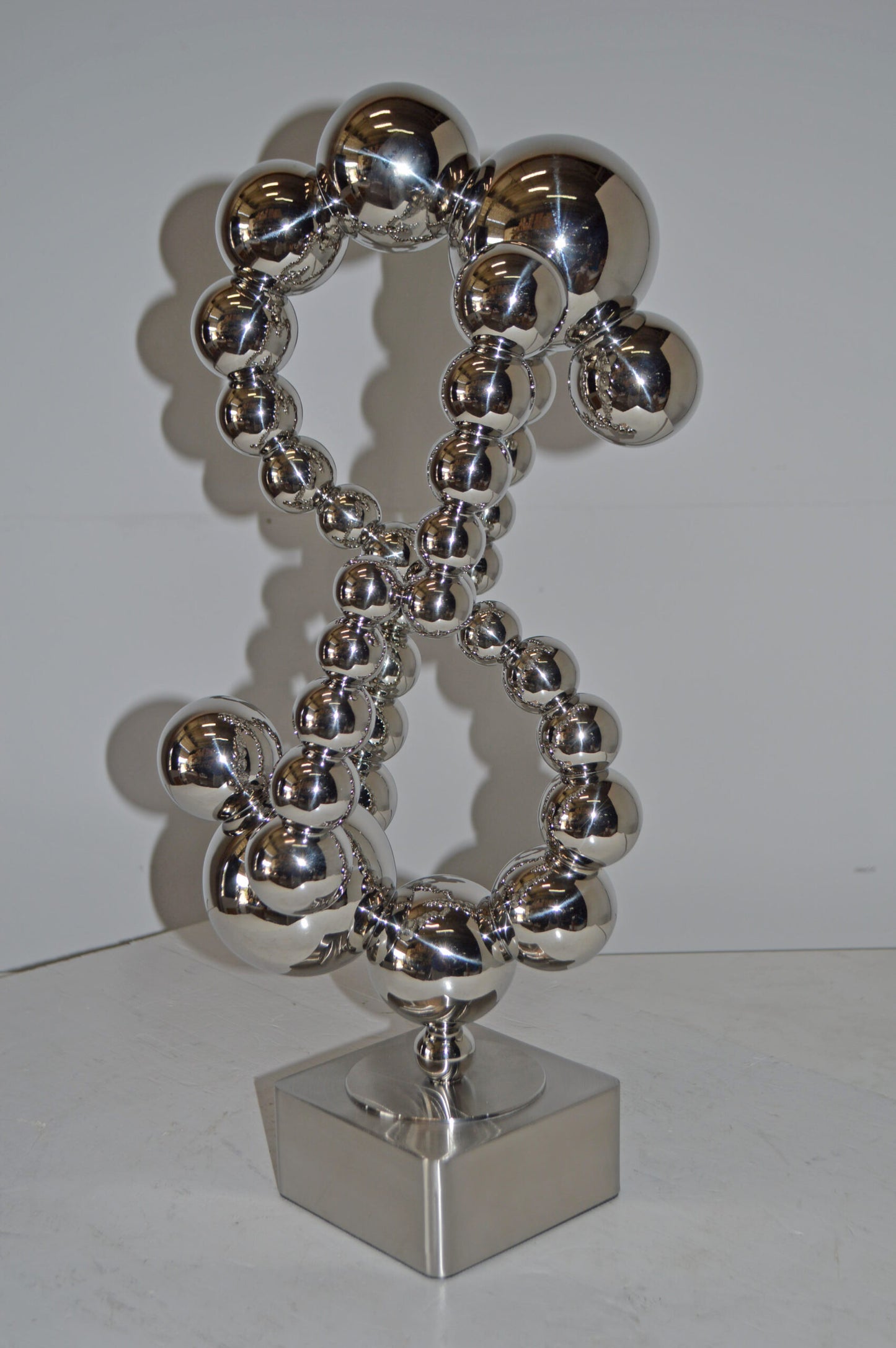 Modern Art Abstract Made of Chrome Balls Statue - Size: 11"L x 10"W x 22"H.