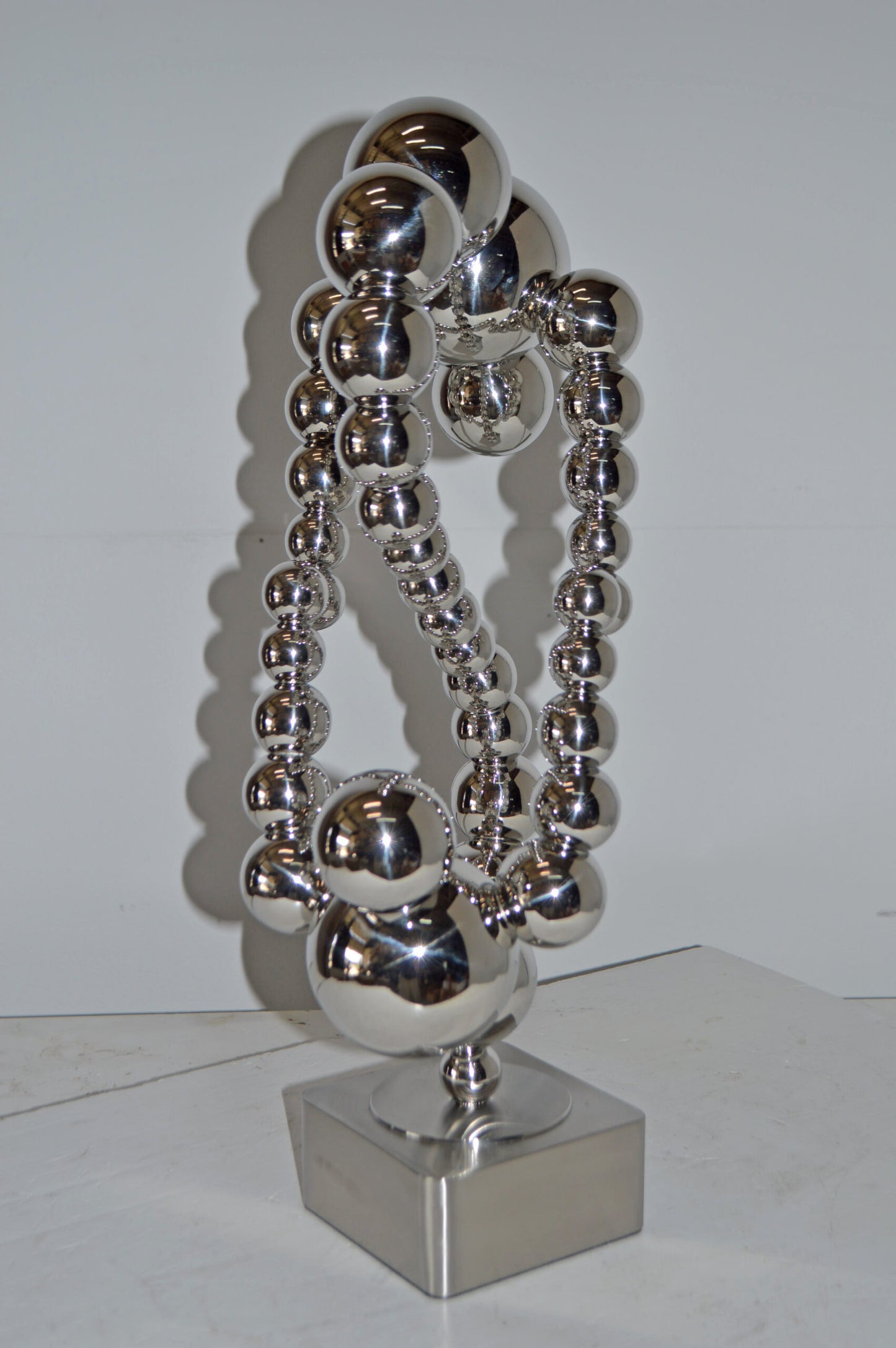 Modern Art Abstract Made of Chrome Balls Statue - Size: 11"L x 10"W x 22"H.