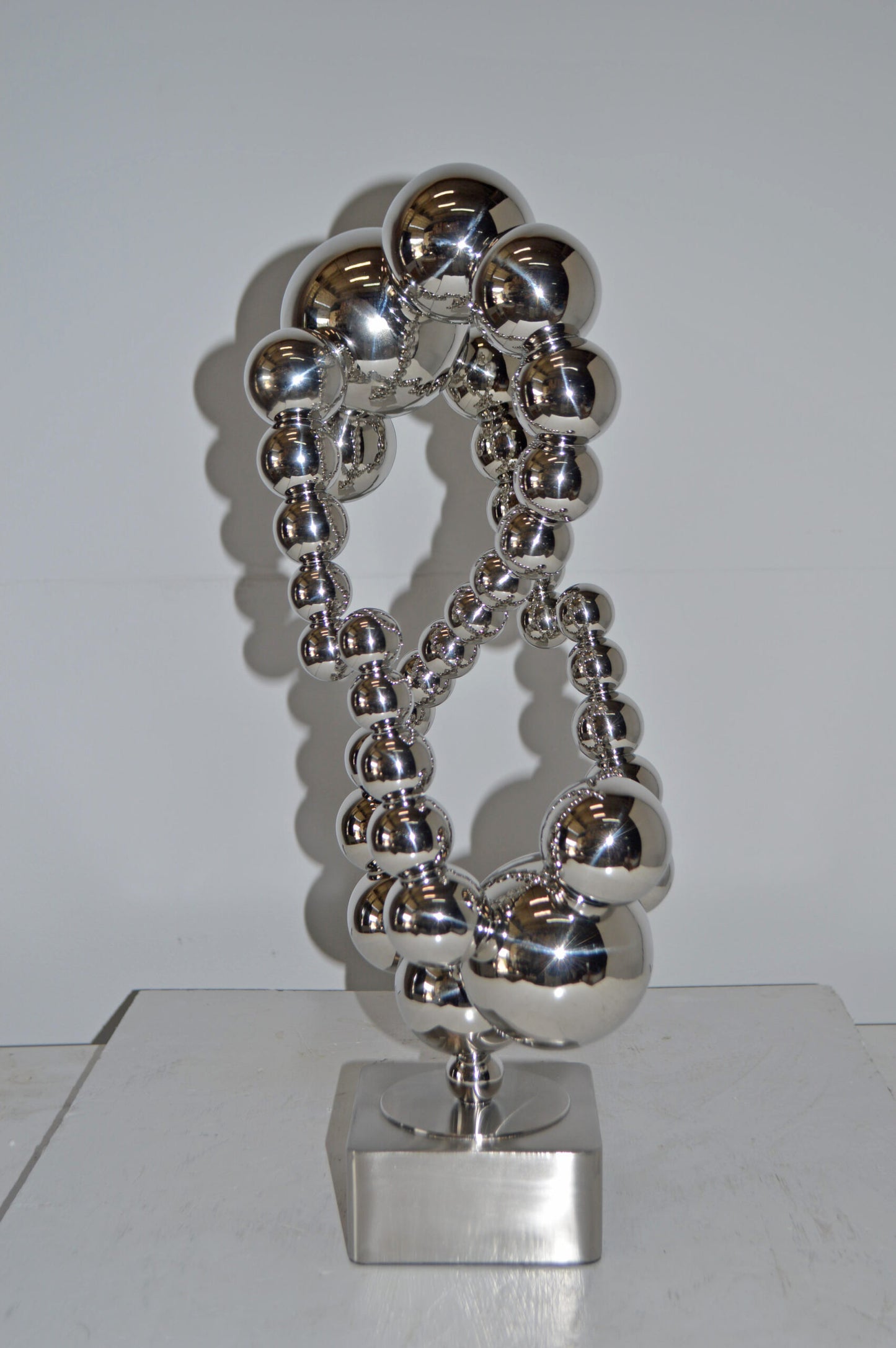 Modern Art Abstract Made of Chrome Balls Statue - Size: 11"L x 10"W x 22"H.