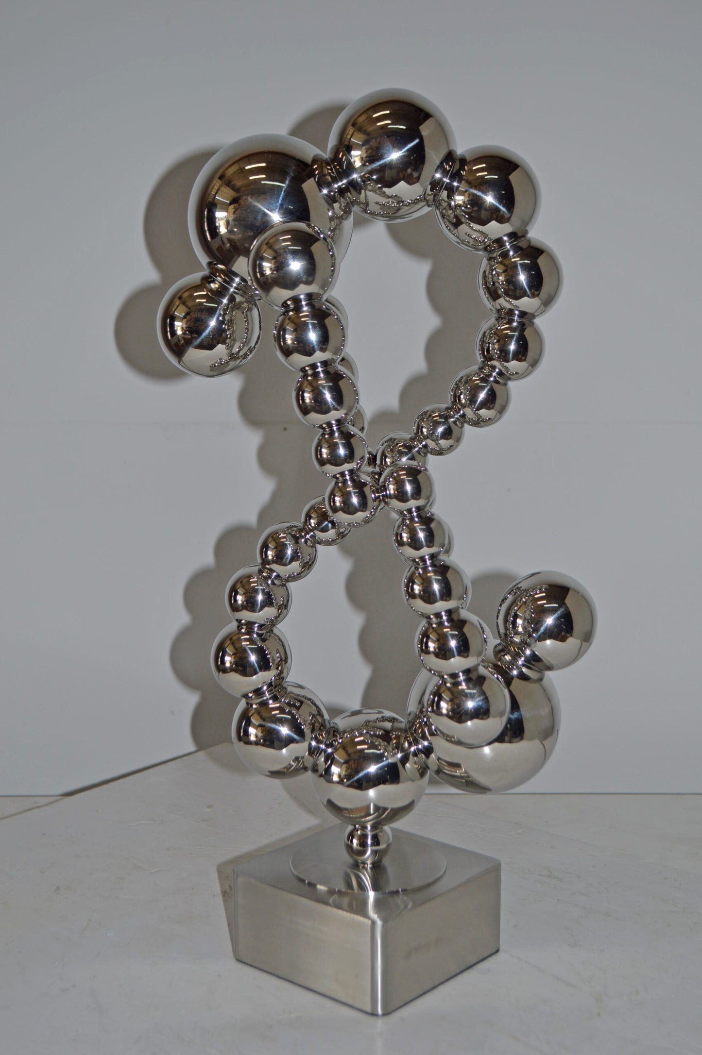Modern Art Abstract Made of Chrome Balls Statue - Size: 11"L x 10"W x 22"H.