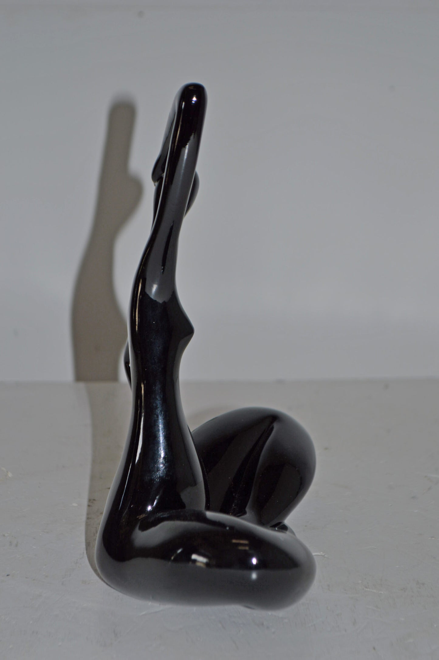 Modern Art Black Ballet Dancer Sitting Resin Statue - Size: 9"L x 5"W x 11"H.