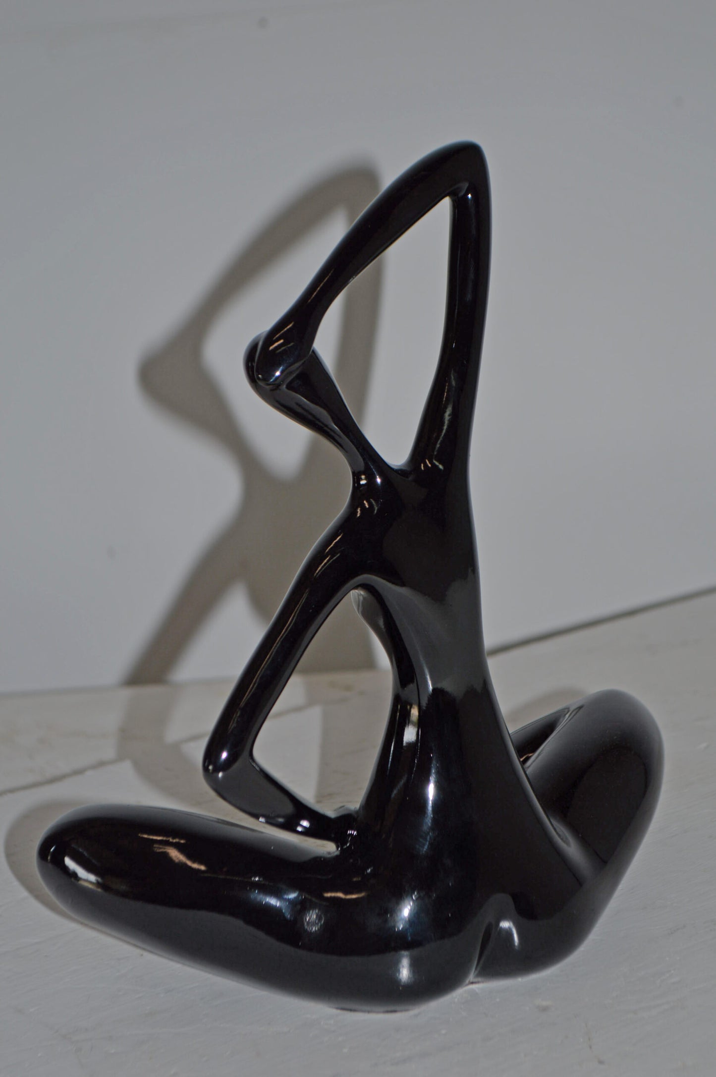 Modern Art Black Ballet Dancer Sitting Resin Statue - Size: 9"L x 5"W x 11"H.