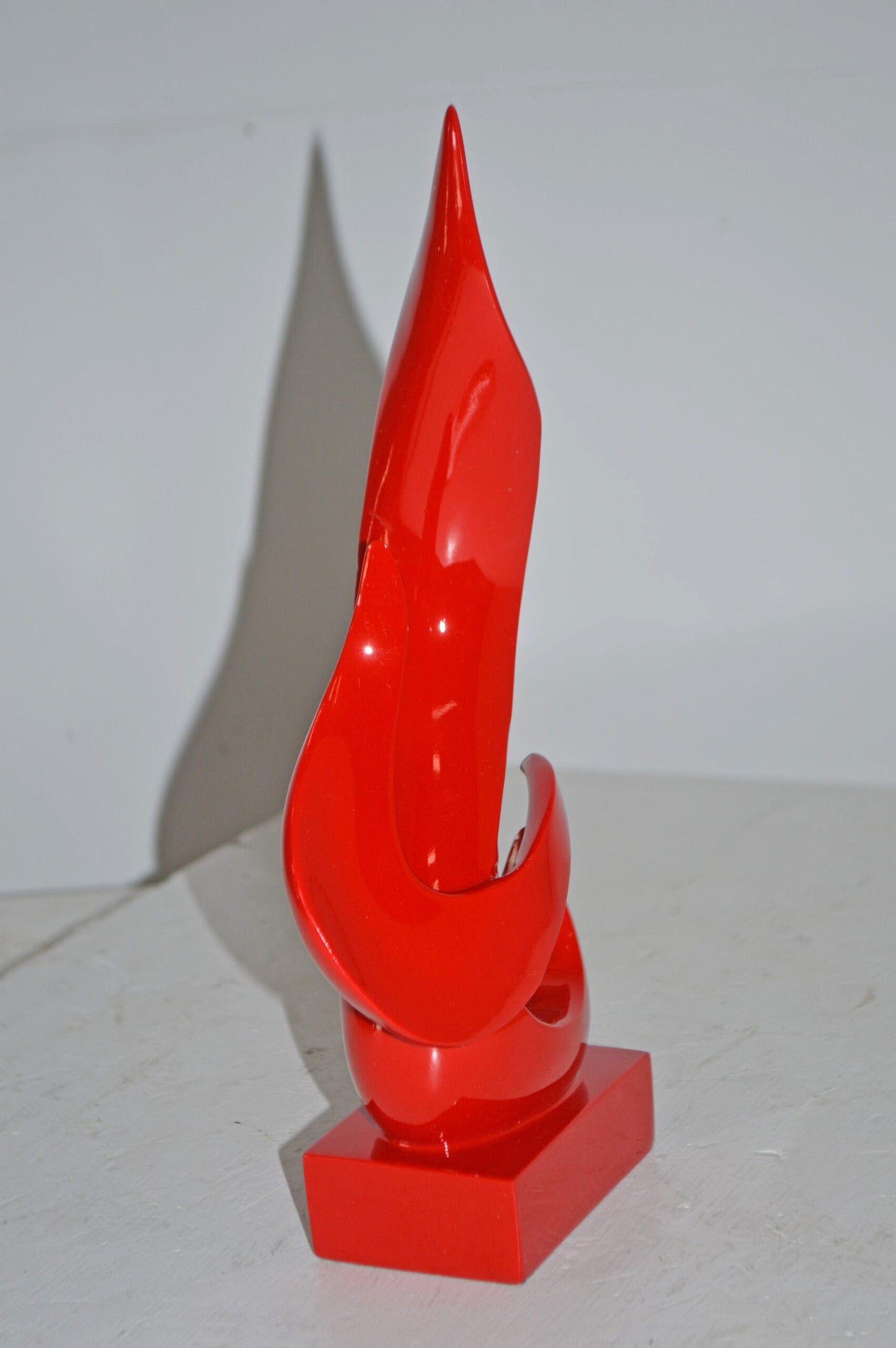 Modern Art Abstract of Fire Red Resin Statue - Size: 6"L x 3"W x 12"H.