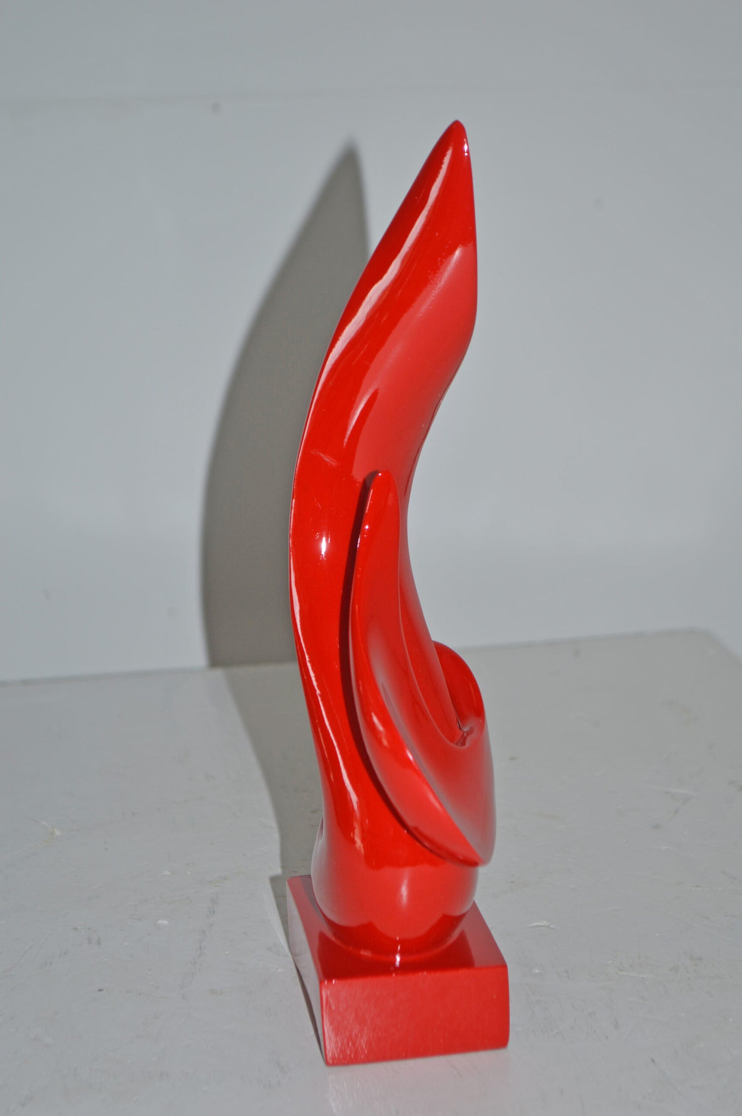 Modern Art Abstract of Fire Red Resin Statue - Size: 6"L x 3"W x 12"H.