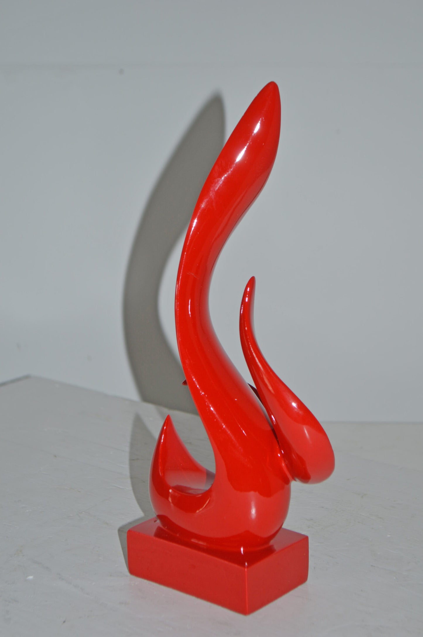 Modern Art Abstract of Fire Red Resin Statue - Size: 6"L x 3"W x 12"H.