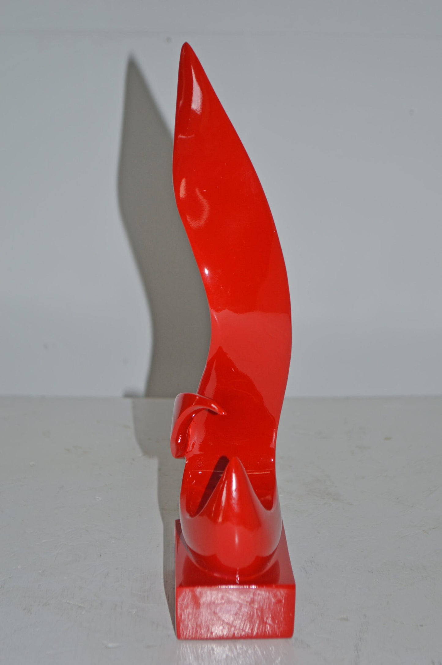 Modern Art Abstract of Fire Red Resin Statue - Size: 6"L x 3"W x 12"H.