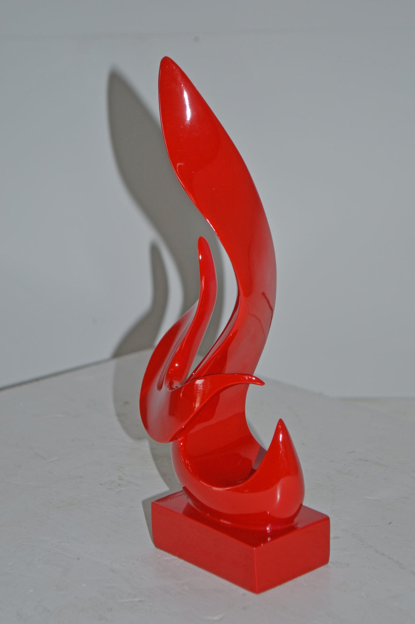 Modern Art Abstract of Fire Red Resin Statue - Size: 6"L x 3"W x 12"H.