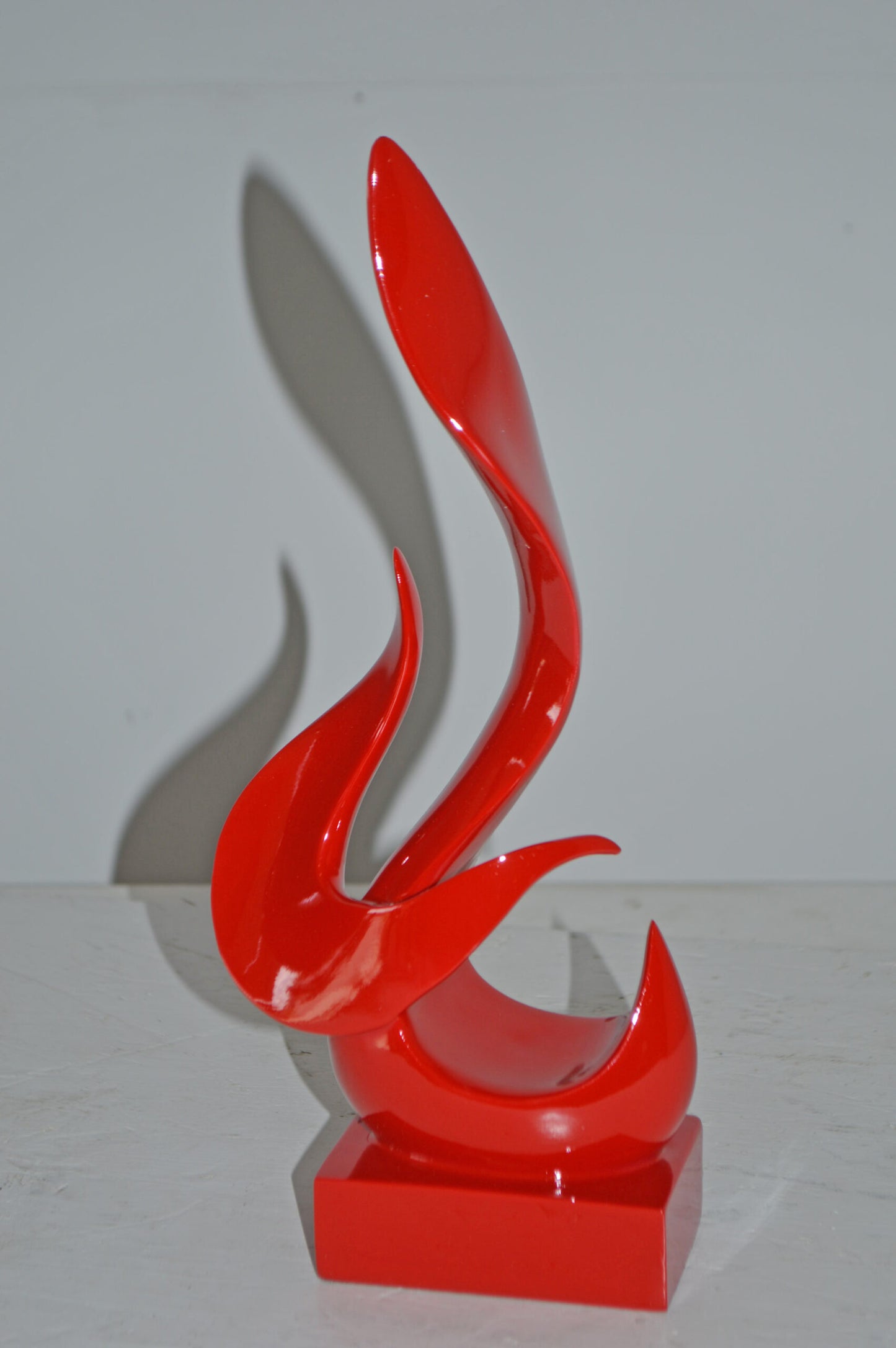 Modern Art Abstract of Fire Red Resin Statue - Size: 6"L x 3"W x 12"H.