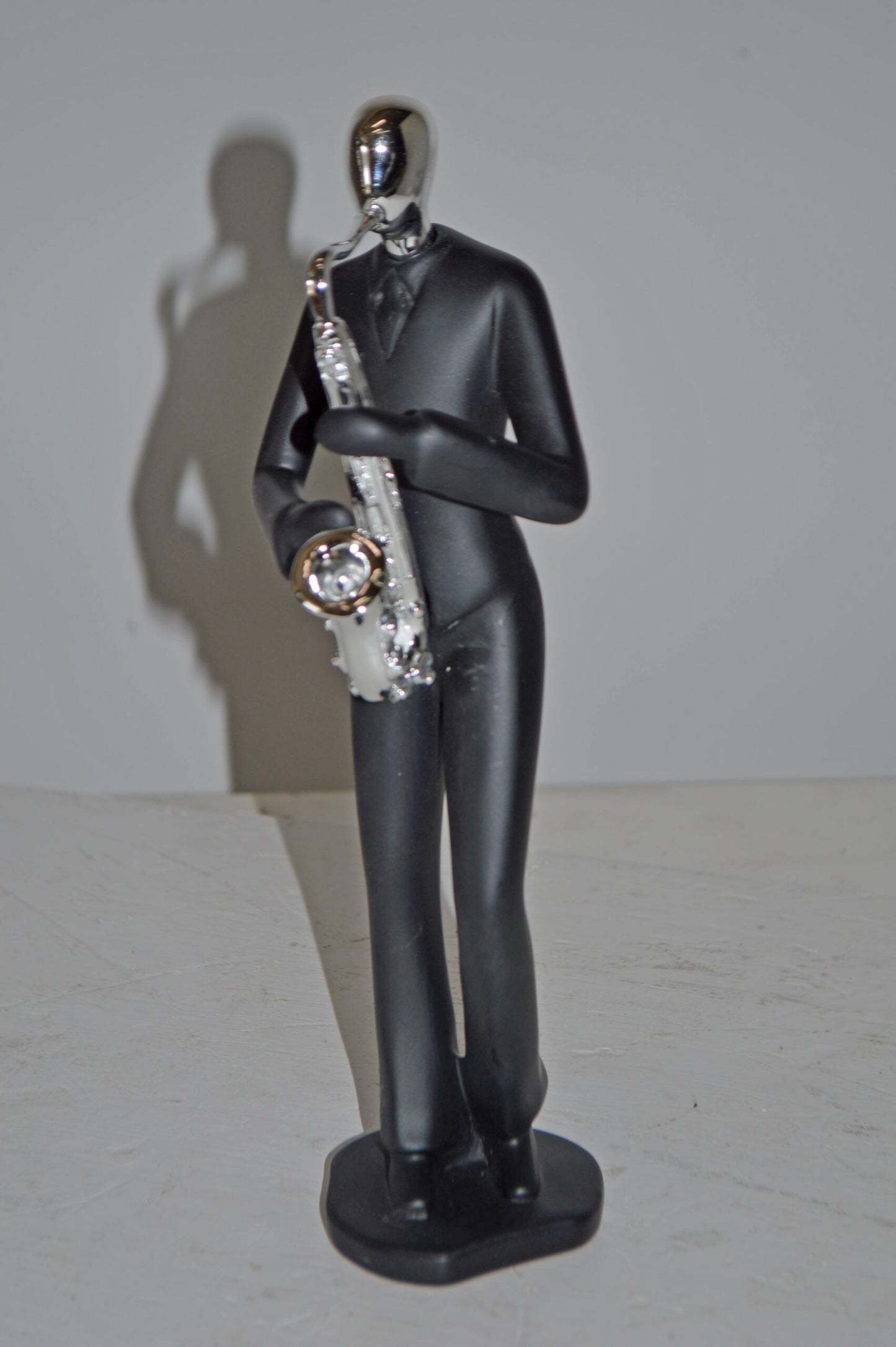 Modern Art Black and Chrome Man Play Saxophone Resin Statue - Size: 4"x3"x11"H