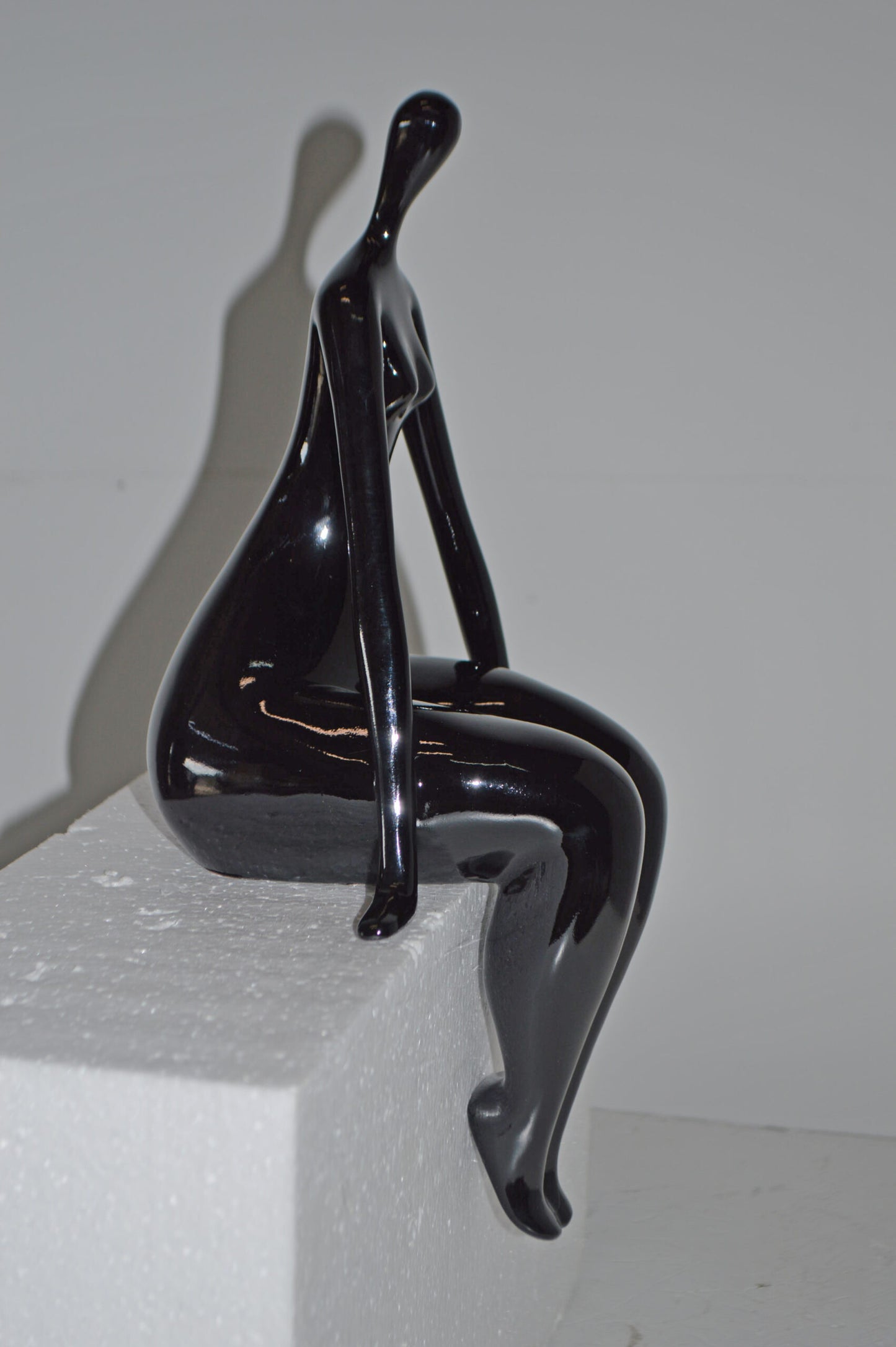 Modern Art Black Sitting on Edge Girl Made of Resin - Size: 8"L x 6"W x 15"H.