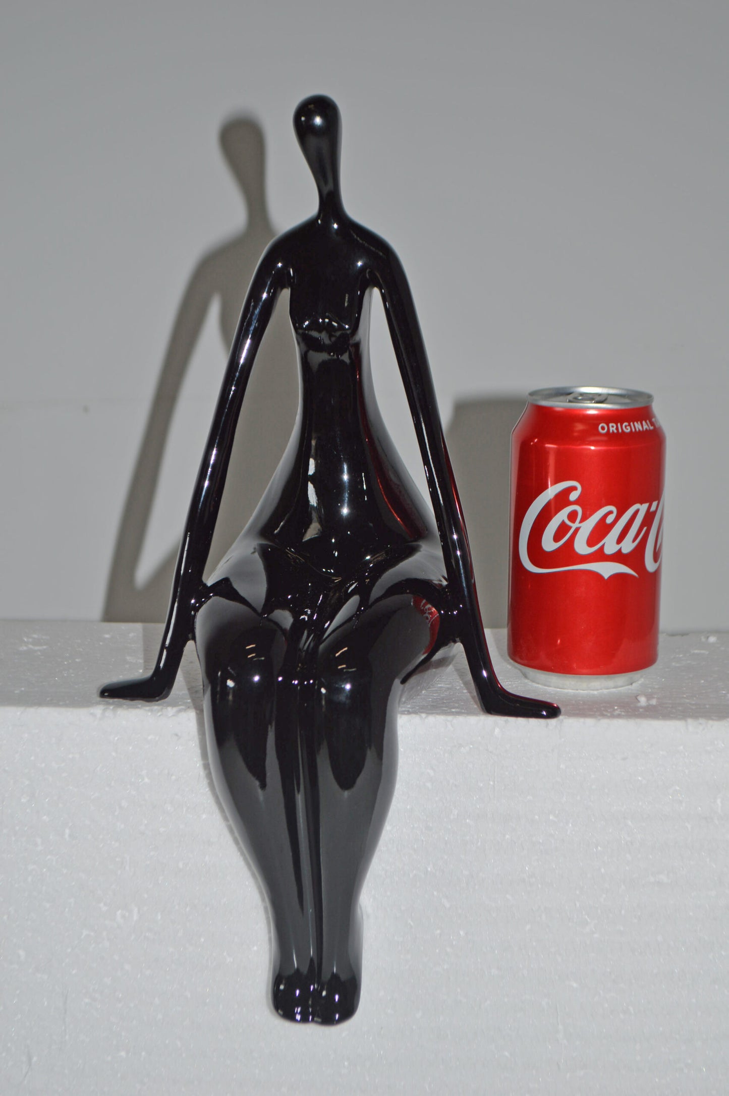 Modern Art Black Sitting on Edge Girl Made of Resin - Size: 8"L x 6"W x 15"H.