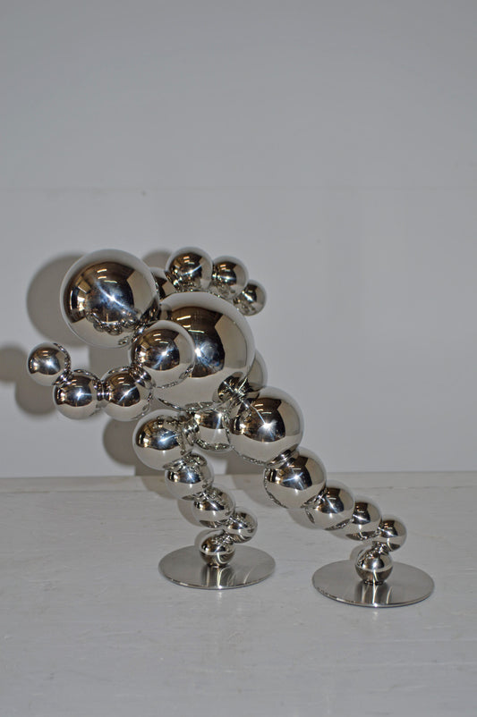 Modern Art Abstract of a Runner made of Chrome Balls - Size: 13"L x 9"W x 11"H.