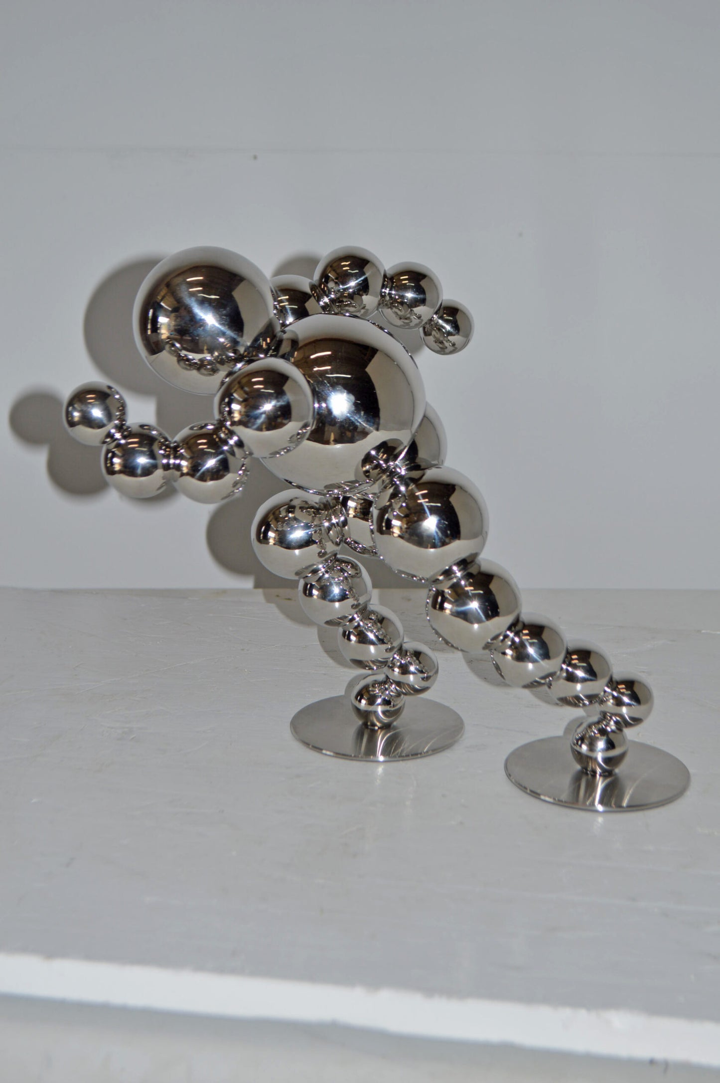 Modern Art Abstract of a Runner made of Chrome Balls - Size: 13"L x 9"W x 11"H.