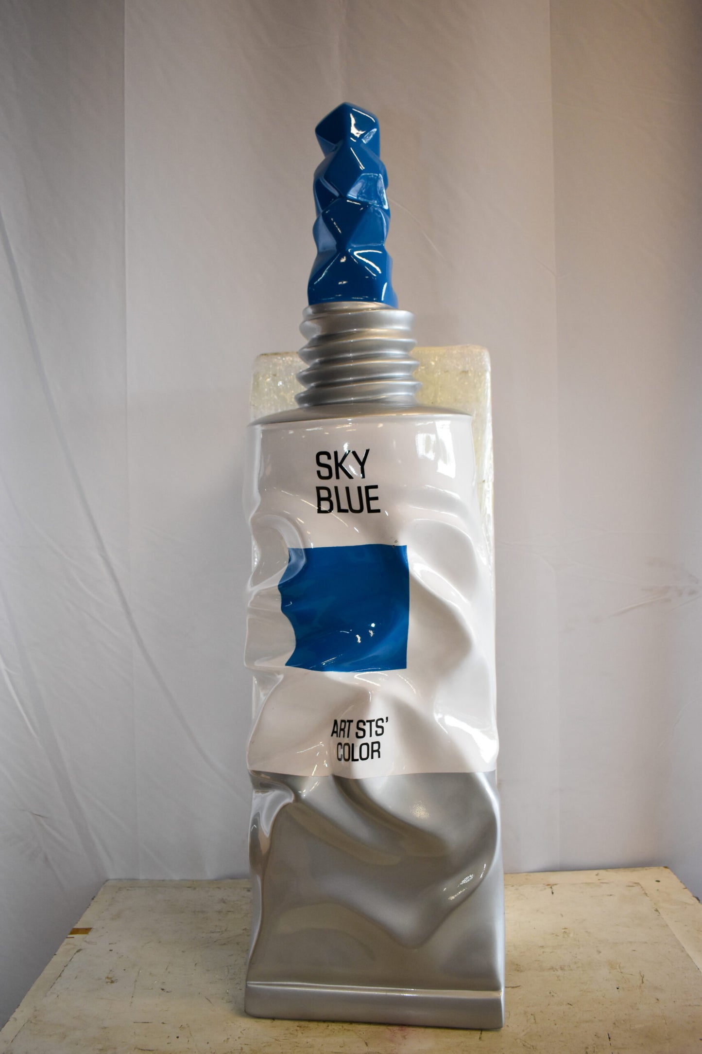 Oversized Wall Mounted Sky Blue Paint Tube Squezed Resin Statue 10" x 12" x 44"H
