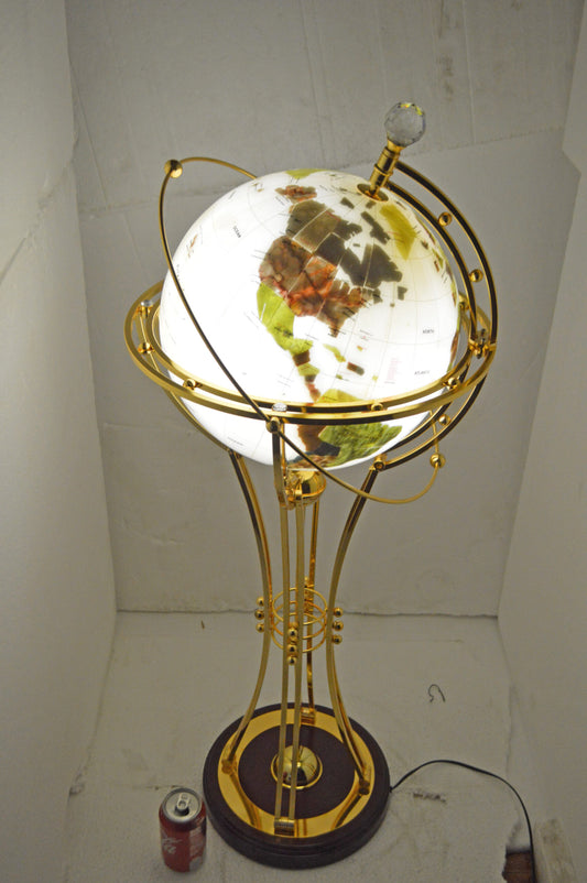 Illuminated White Gold World Globe Rotated by motor - Size: 19"L x 19"W x 42"H.