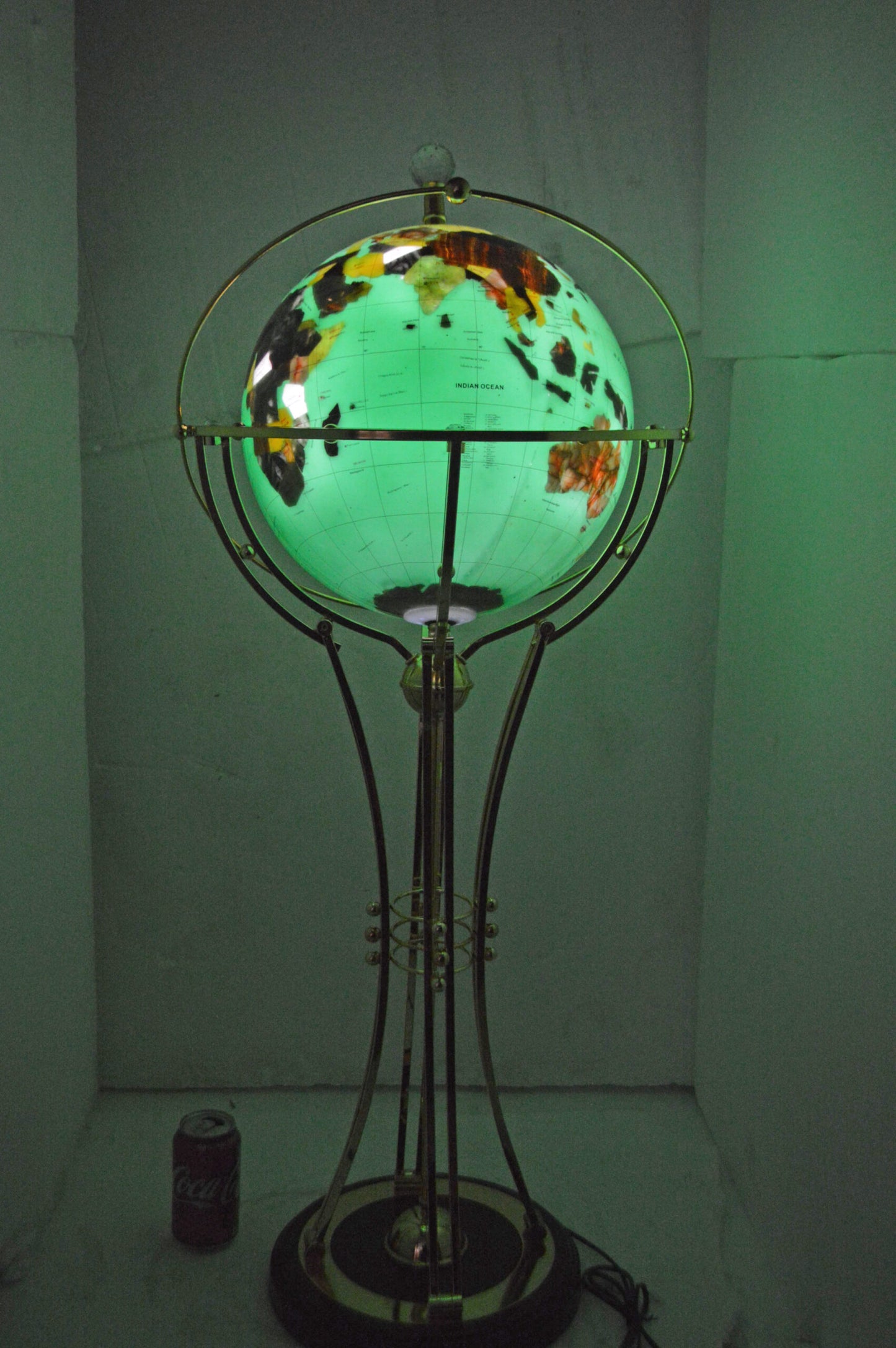 Illuminated Green - Gold World Globe Rotated by a motor - Size: 19" x 19" x 42"H