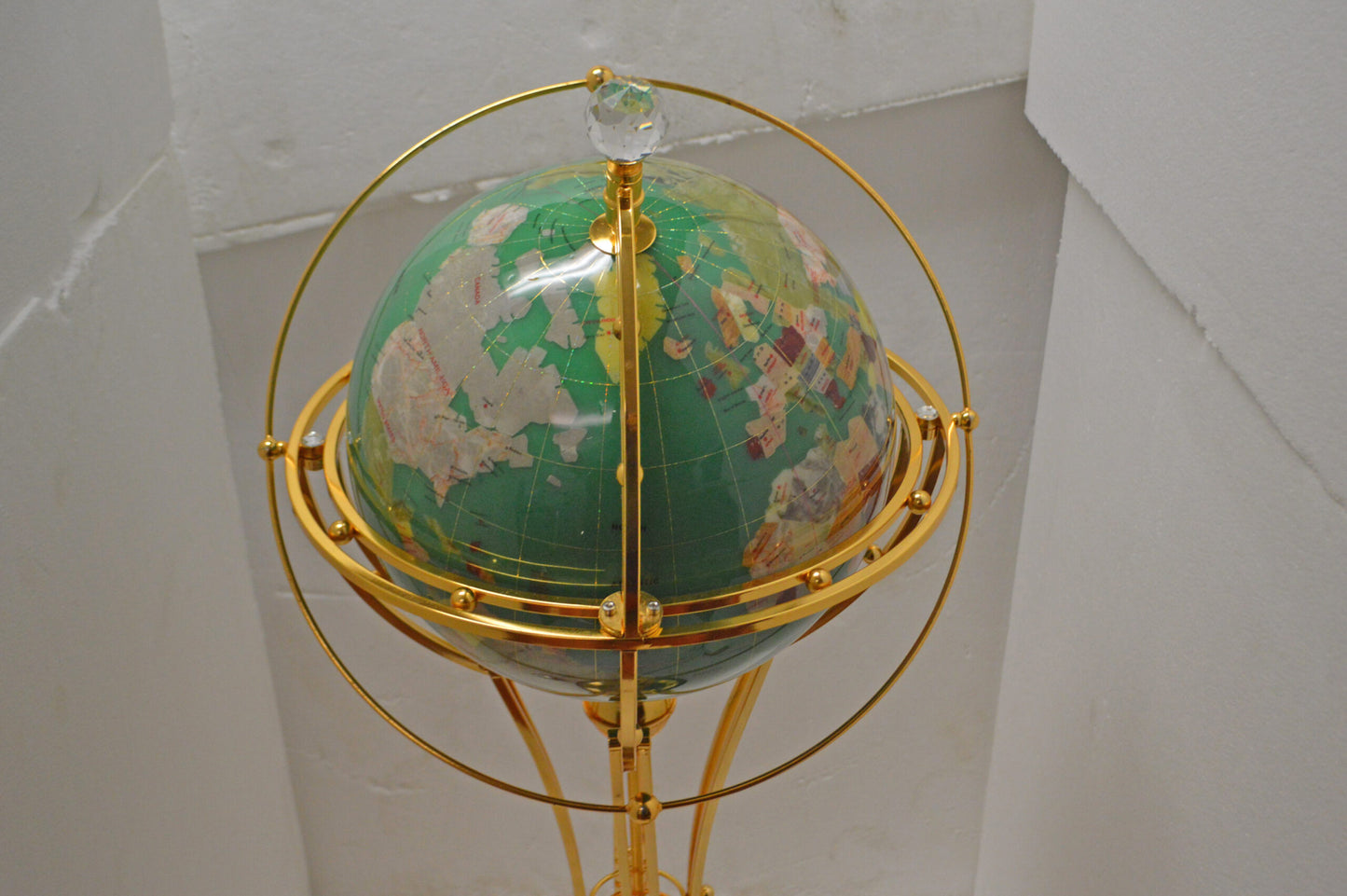 Illuminated Green - Gold World Globe Rotated by a motor - Size: 19" x 19" x 42"H