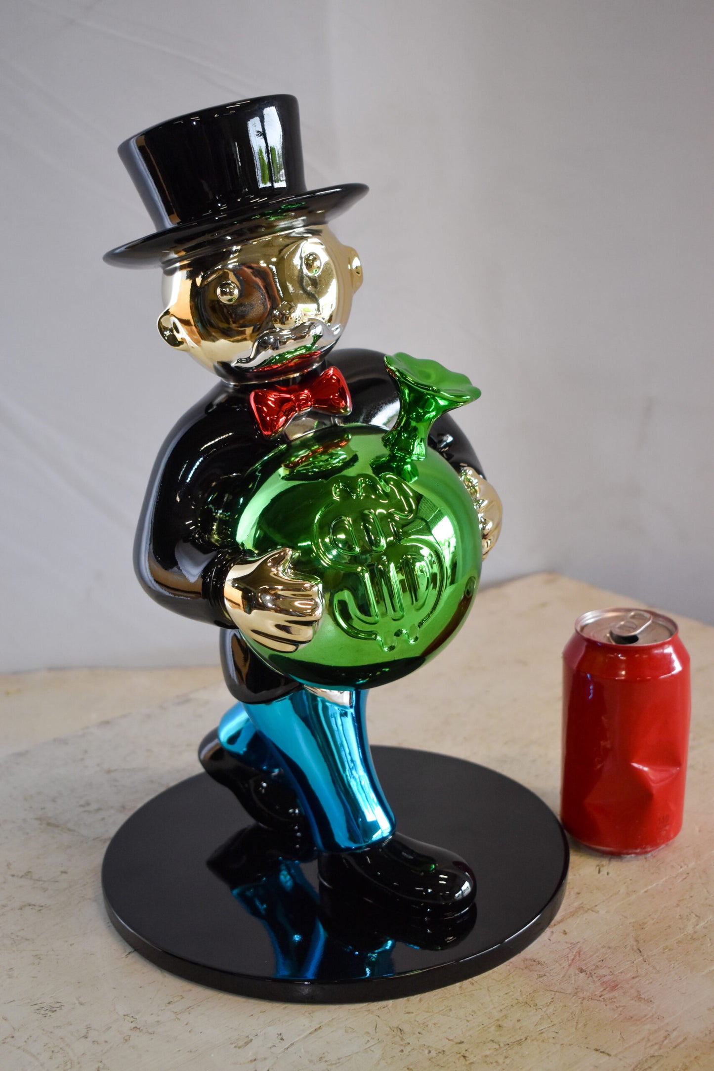 Walking Monopoly Man with Money Bag on Black Base Resin Statue 10" x 10" x 16"H