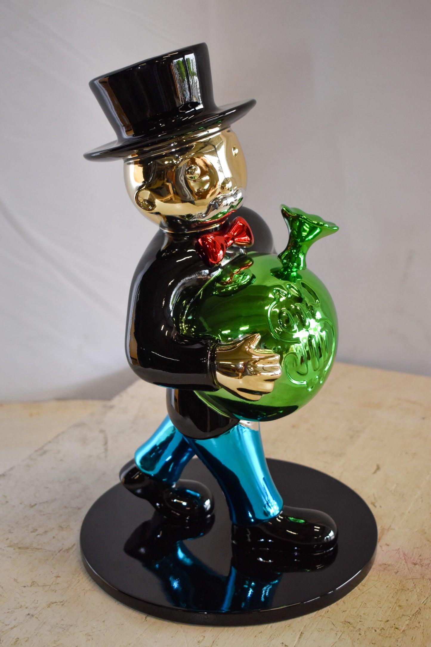 Walking Monopoly Man with Money Bag on Black Base Resin Statue 10" x 10" x 16"H