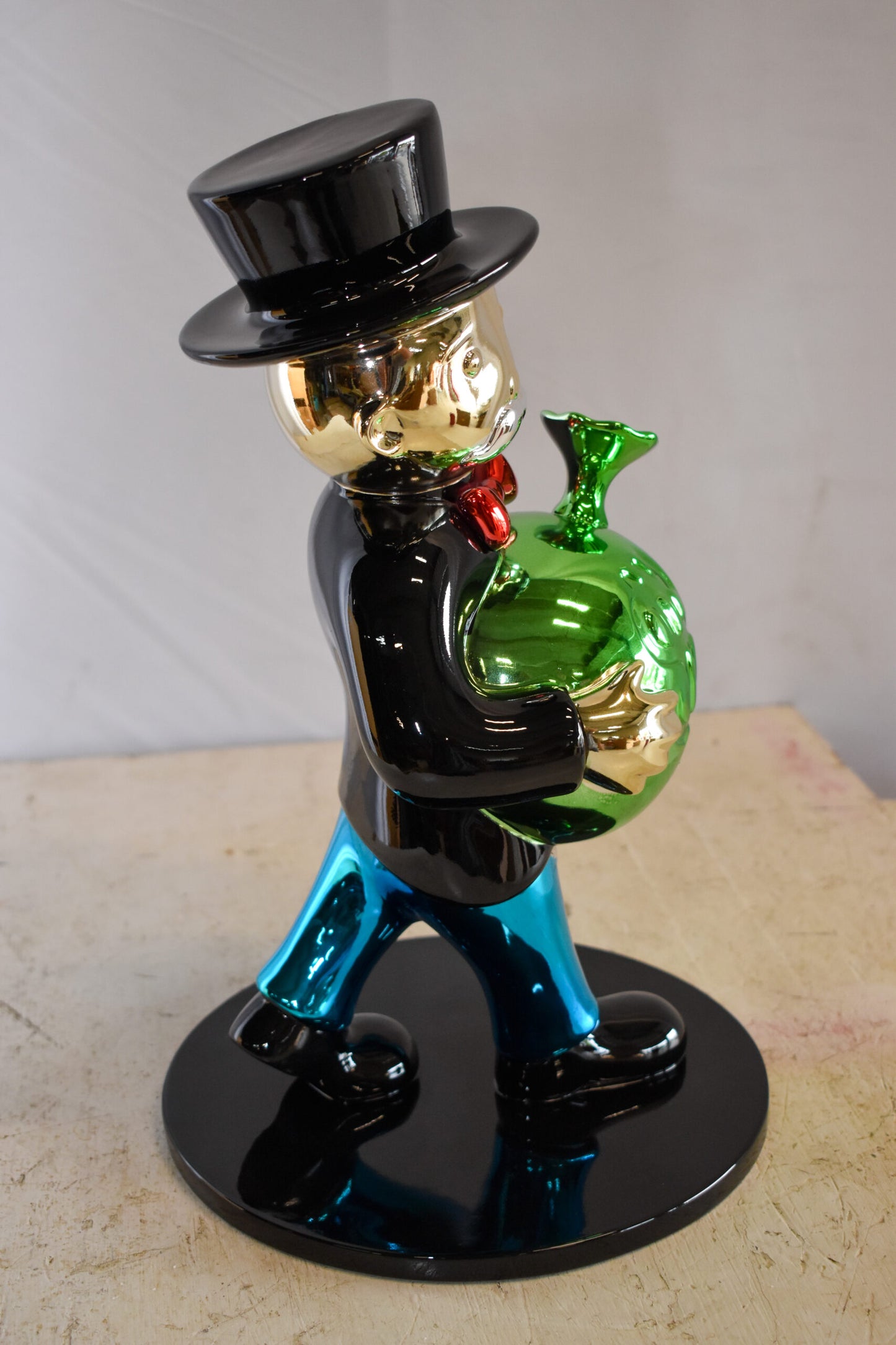 Walking Monopoly Man with Money Bag on Black Base Resin Statue 10" x 10" x 16"H