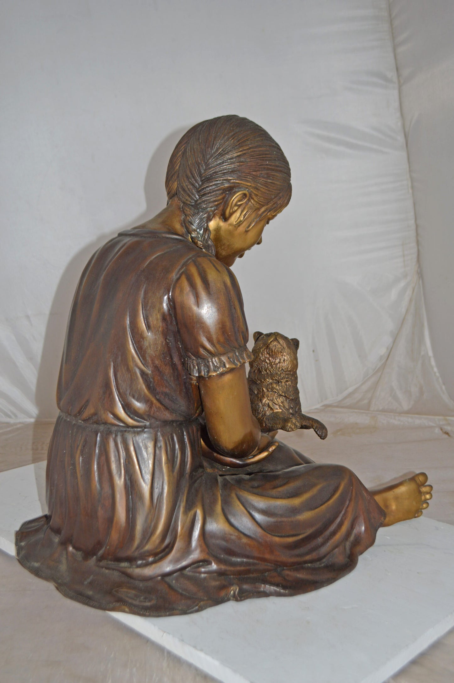 Girl Holding Her Cat Life Size Bronze Statue - Size: 23"L x 20"W x 24"H.